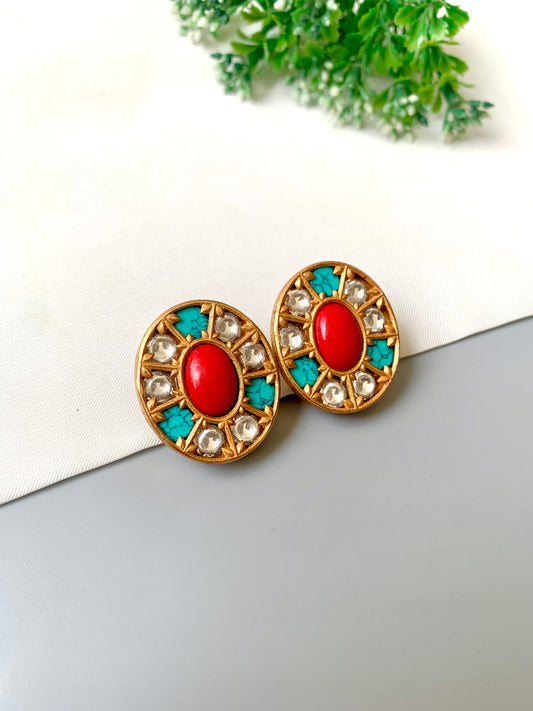 Hand-crafted oval studs with coral center, moissanite halo and feroza inlay in 22kt Victorian polish — Zamal Jewels