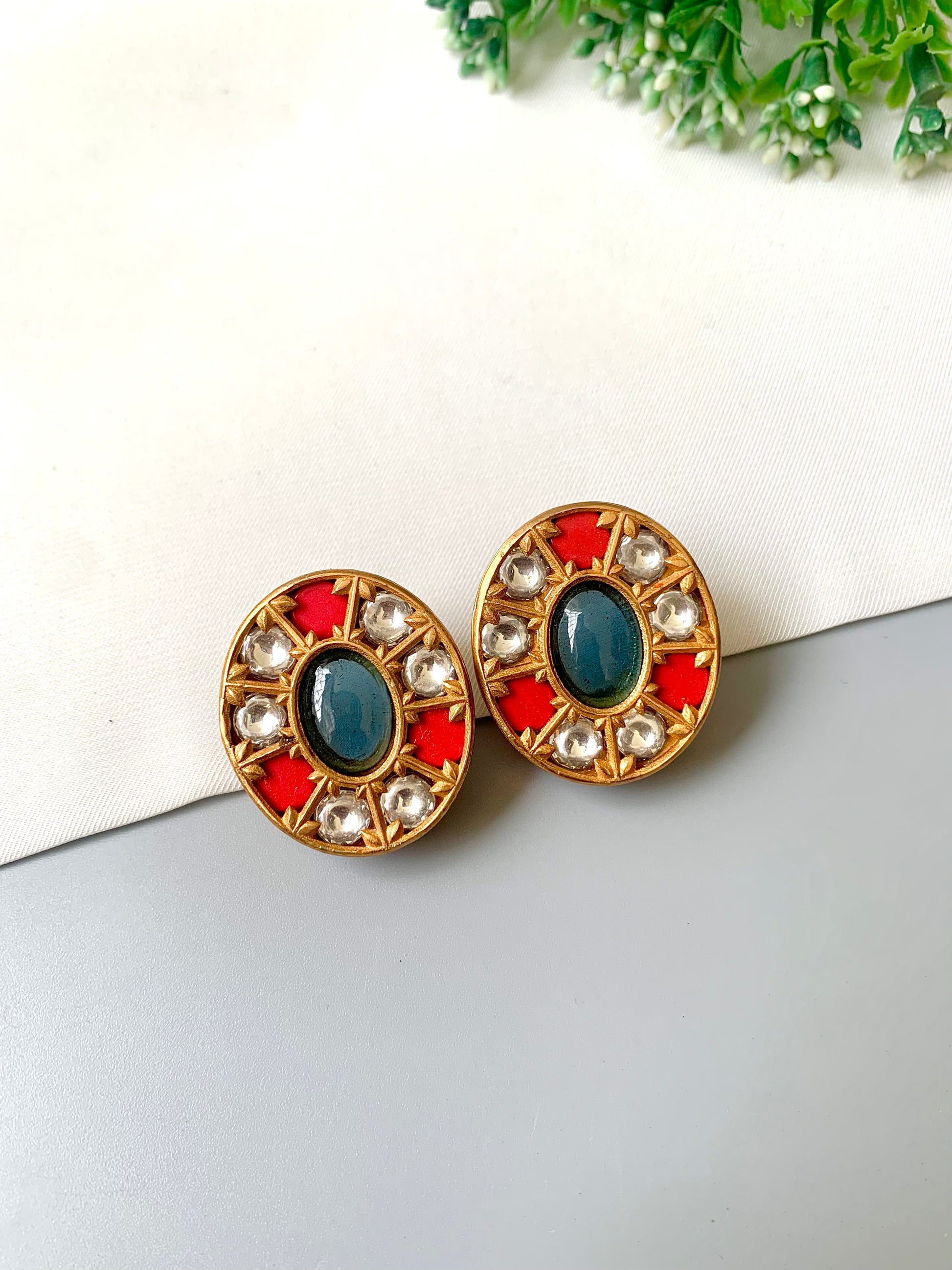 Hand-crafted oval studs with sapphire center, moissanite halo and coral inlay in 22kt Victorian polish — Zamal Jewels