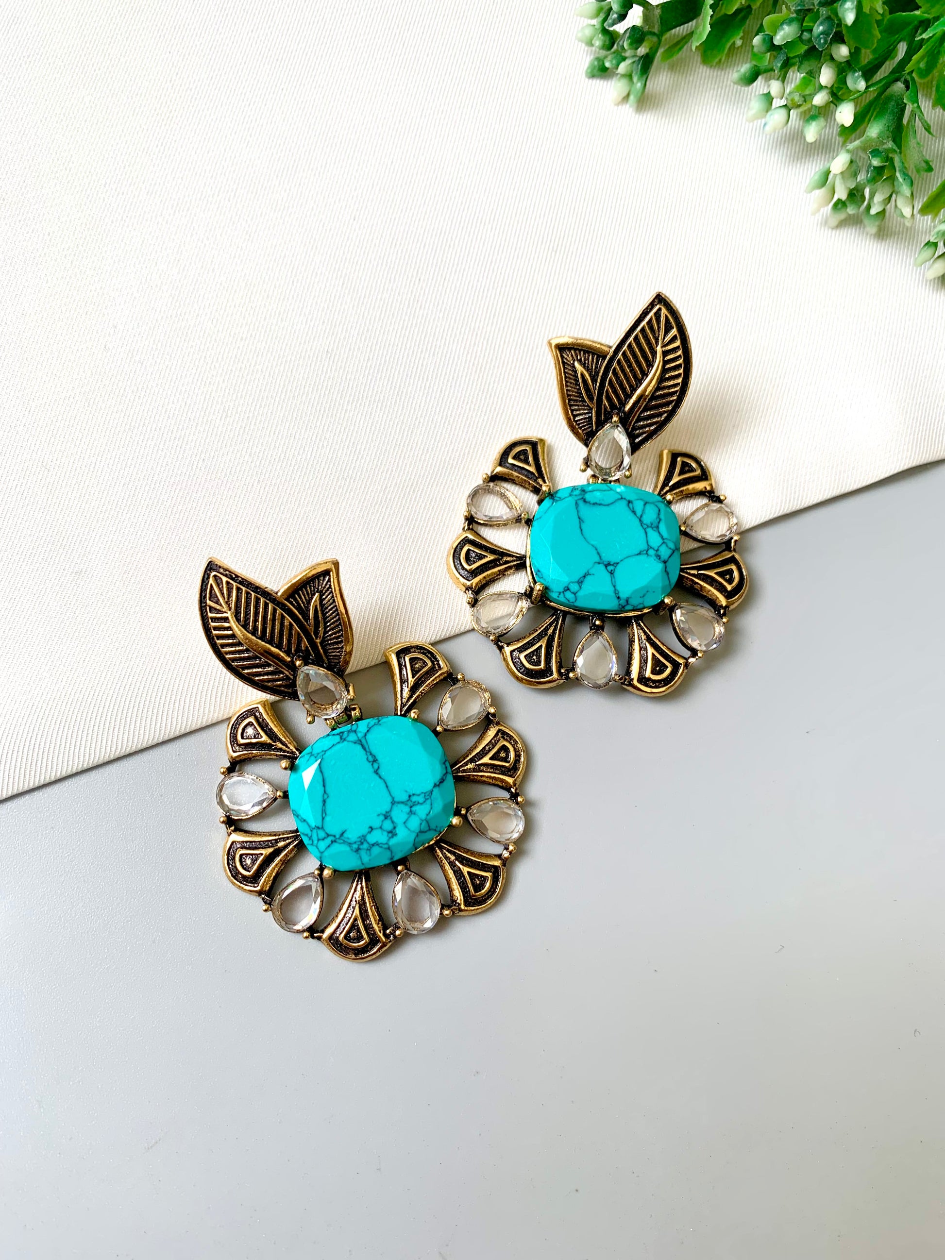Hand-crafted Zarmina Earrings in semi-precious Feroza with Polki diamonds, hand-painted Meena, and 22kt Victorian Gold matte plating by Zamal Jewels.