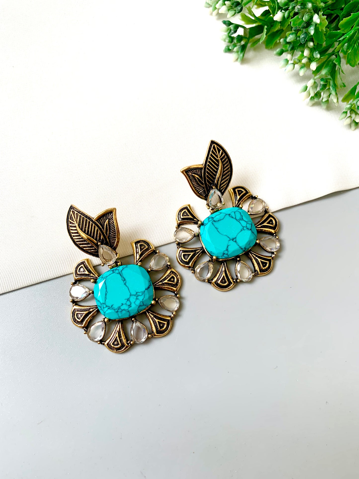Hand-crafted Zarmina Earrings in semi-precious Feroza with Polki diamonds, hand-painted Meena, and 22kt Victorian Gold matte plating by Zamal Jewels.