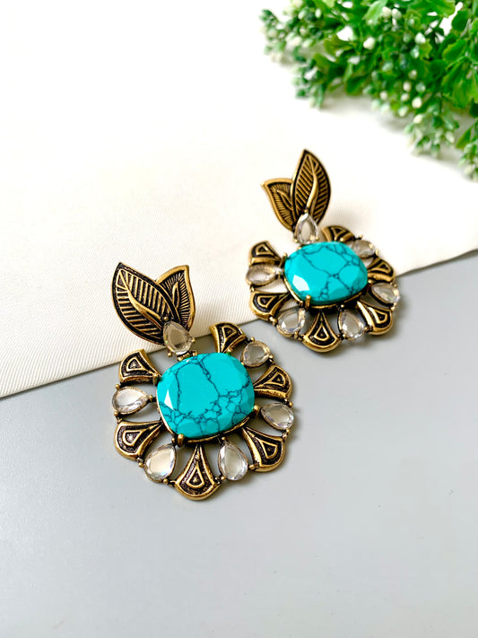 Hand-crafted Zarmina Earrings in semi-precious Feroza with Polki diamonds, hand-painted Meena, and 22kt Victorian Gold matte plating by Zamal Jewels.