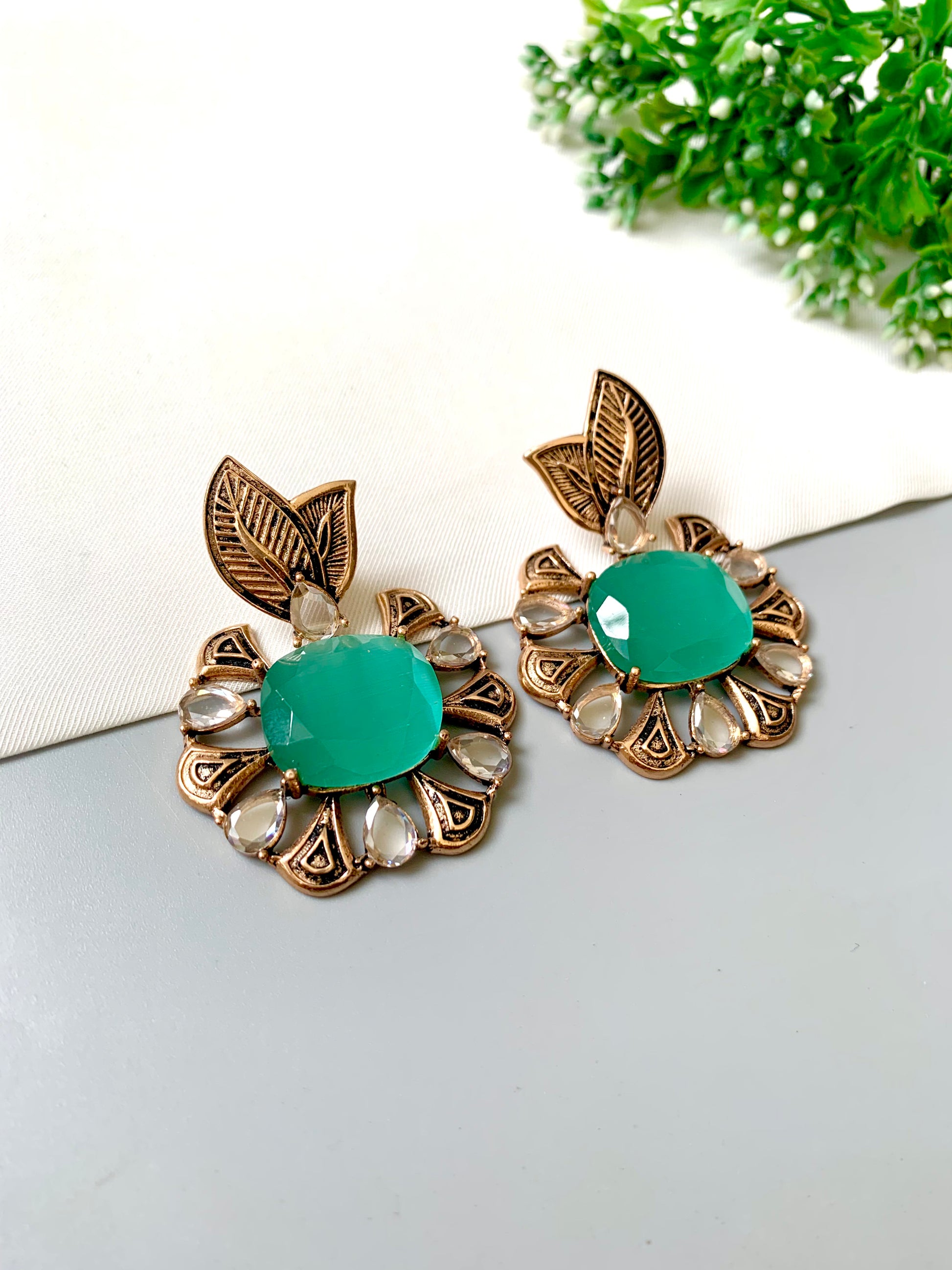 Hand-crafted Zarmina Earrings in semi-precious Mint Onyx with Polki diamonds, hand-painted Meena, and 22kt Victorian Gold matte plating by Zamal Jewels.