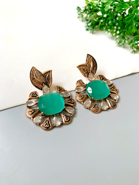 Hand-crafted Zarmina Earrings in semi-precious Mint Onyx with Polki diamonds, hand-painted Meena, and 22kt Victorian Gold matte plating by Zamal Jewels.