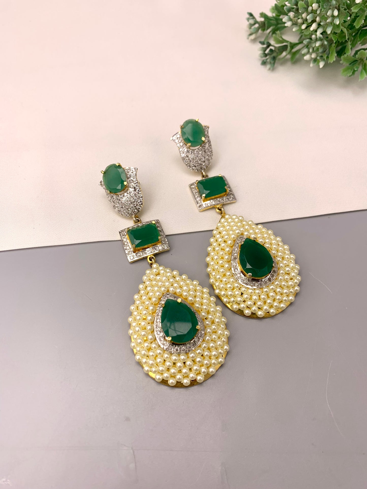 Akshana handcrafted 22kt gold plated earrings with American diamonds, semi-precious emeralds and pearls