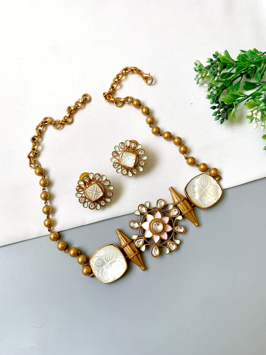Ameera Signature Choker Set featuring hand-carved amethyst tiles, Polki Kundan floral centerpiece, and Meena work in 22kt gold