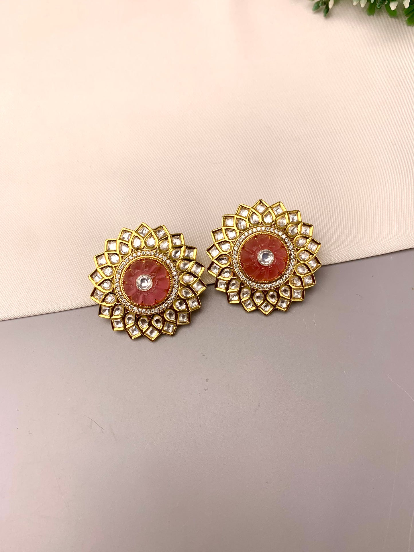 Amilia handcrafted 22kt gold plated studs featuring American Diamonds, Polki Kundan, and semi-precious natural hand-carved melon beads