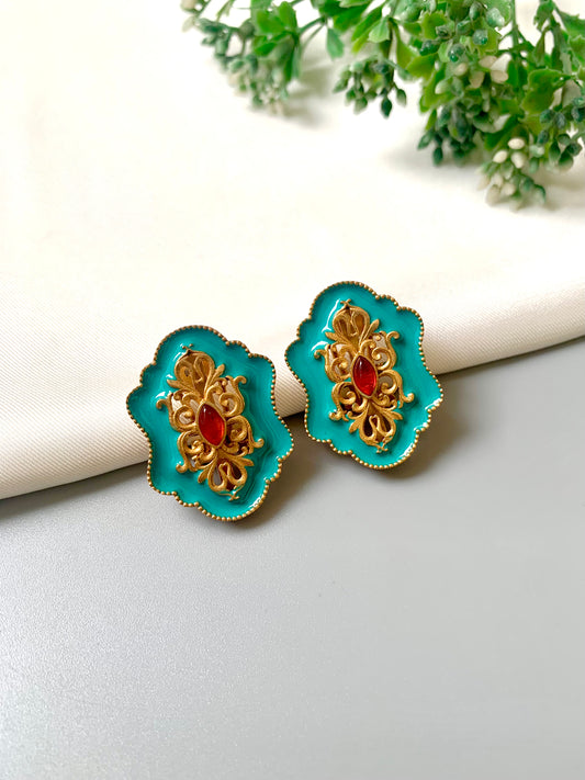 Handcrafted Anisa Stud earrings in Ferozi with 22kt gold plating, high-quality Polki Kundan, and hand-painted Meena work by Zamal Jewels.
