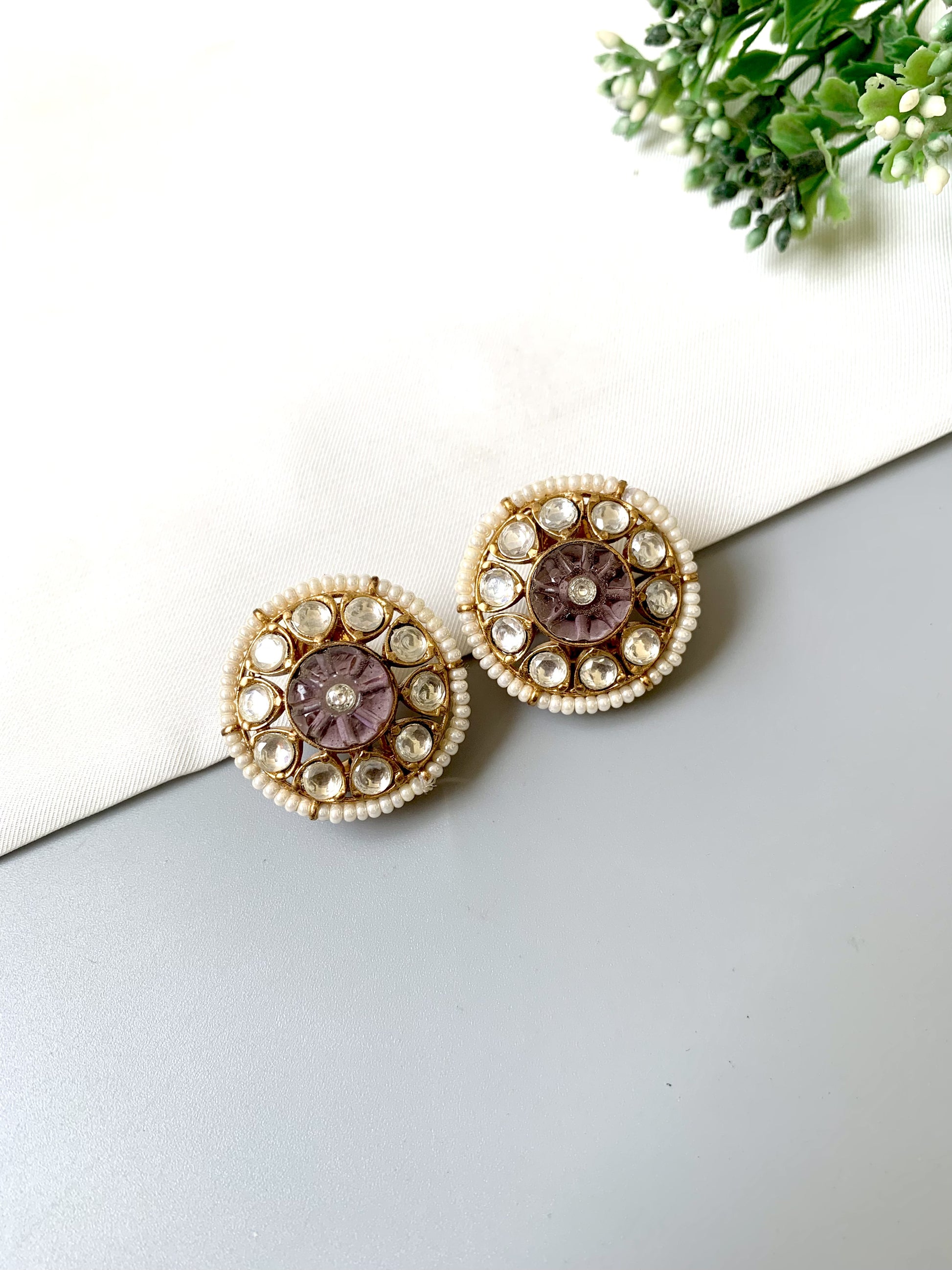 Victorian gold-plated statement studs with amethyst and Polki Kundan detailing, floral centerpiece design