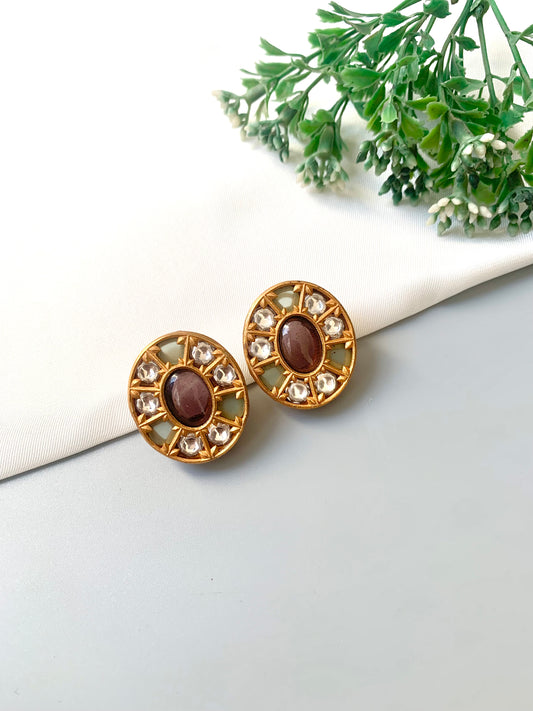 Front view of Asmita Amethyst studs with central amethyst, Polki Kundan, and natural gemstone accents in Victorian gold.