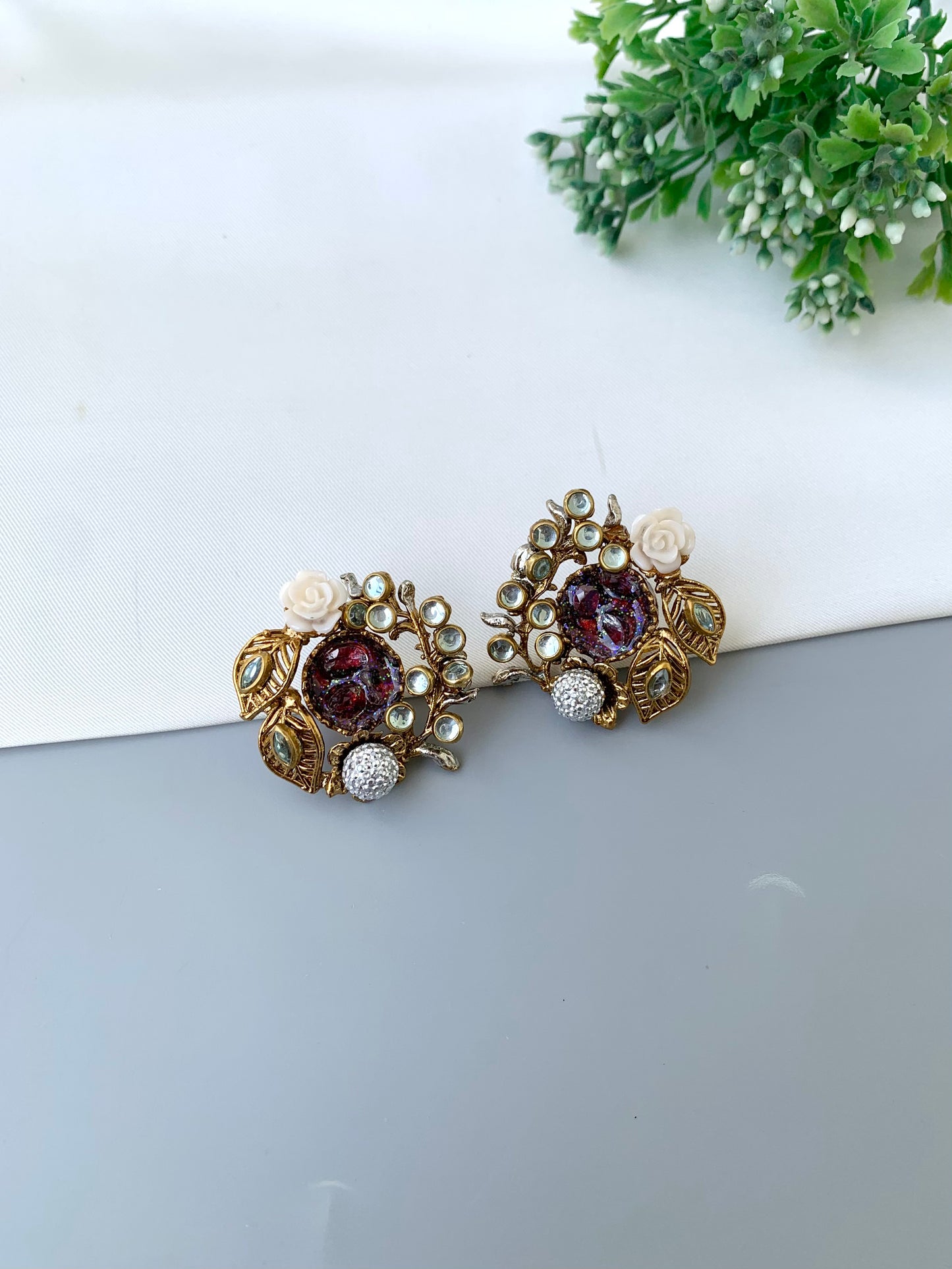 Athena ruby kundan earrings in gold plating with American diamonds and gemstone detailing