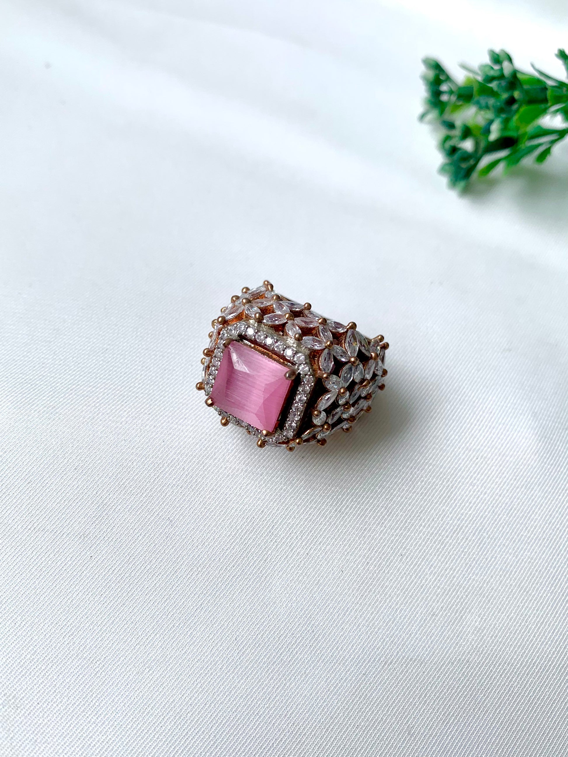 Aurora Rosé Ring by Zamal Jewels in oxidized rose gold finish with pink Onyx and American Diamonds