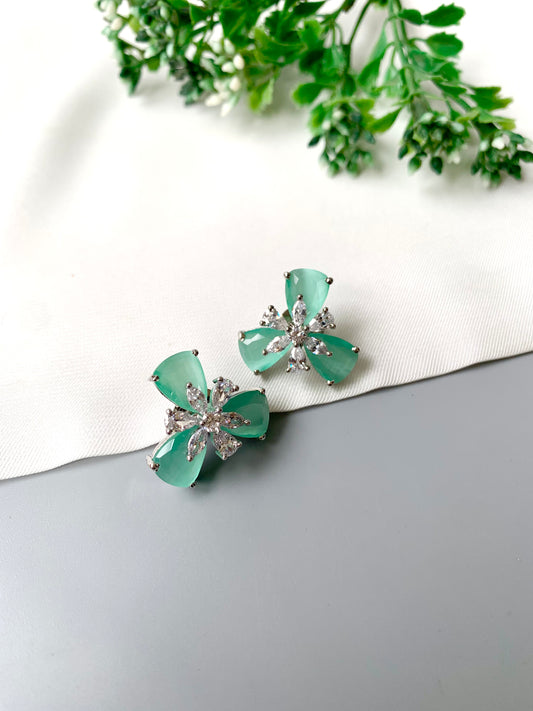 Mint green Onyx floral studs with American Diamonds in platinum polish by Zamal Jewels