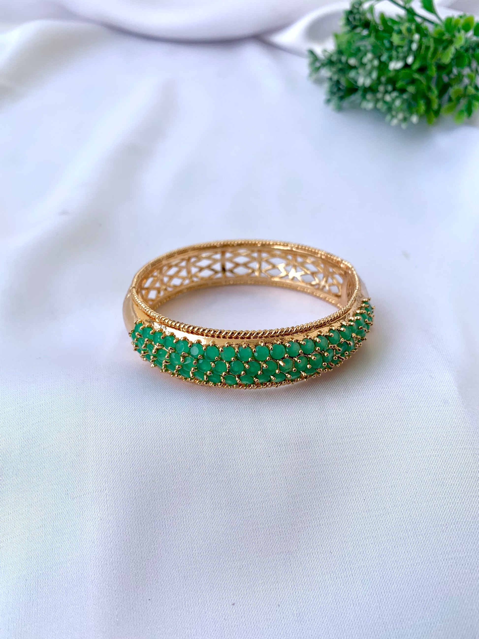 Azeena emerald gold plated openable bangle with minimal gemstone design