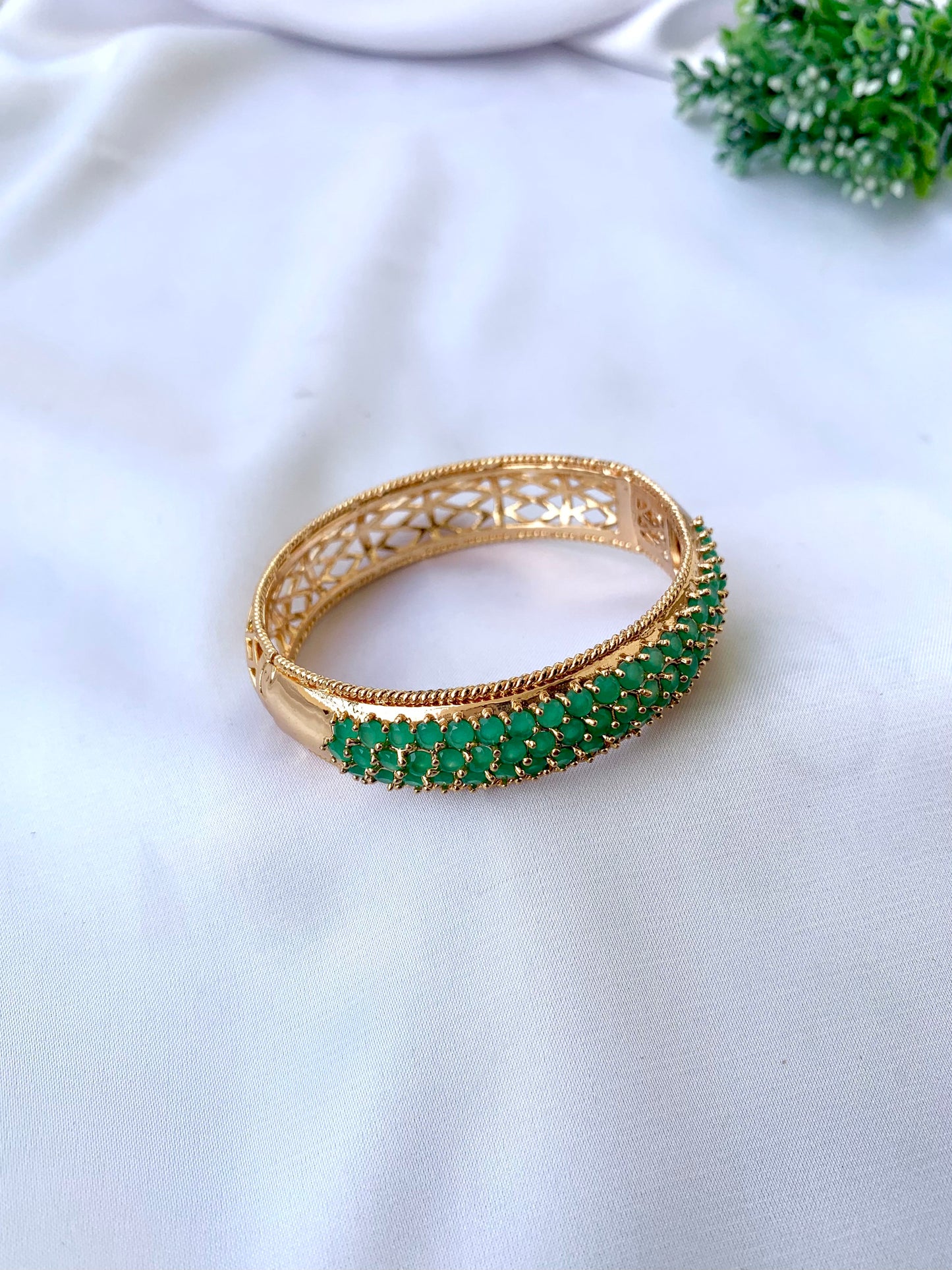 Azeena emerald gold plated openable bangle with minimal gemstone design