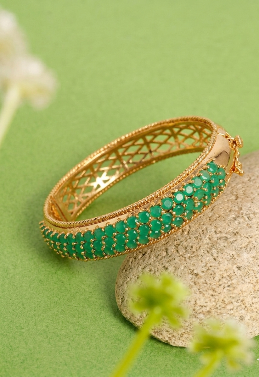 Azeena emerald gold plated openable bangle with minimal gemstone design