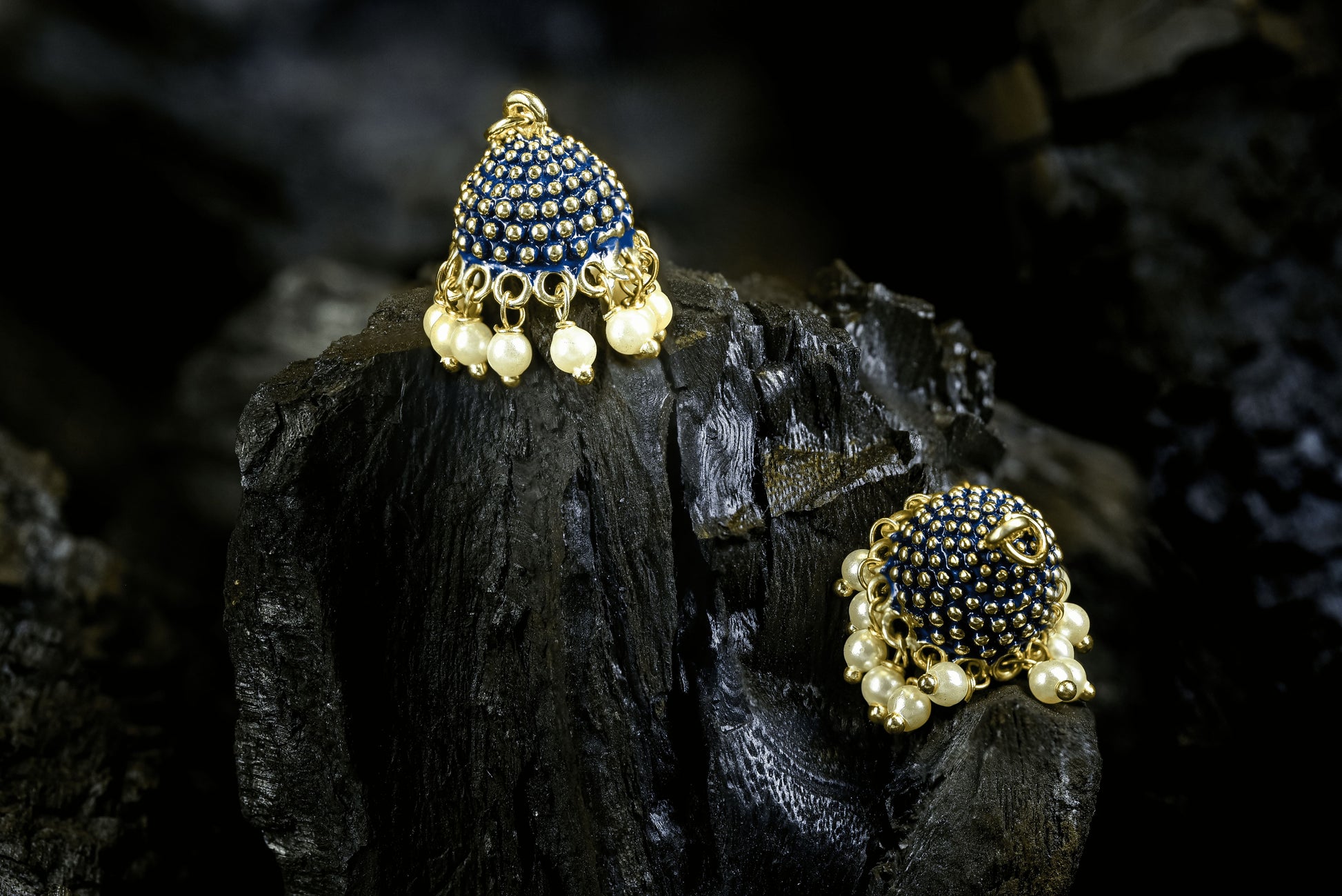 Deep navy blue Meena dome jhumka with gold finish and pearl drops from Zamal Jewels' Baila Jhumki Set