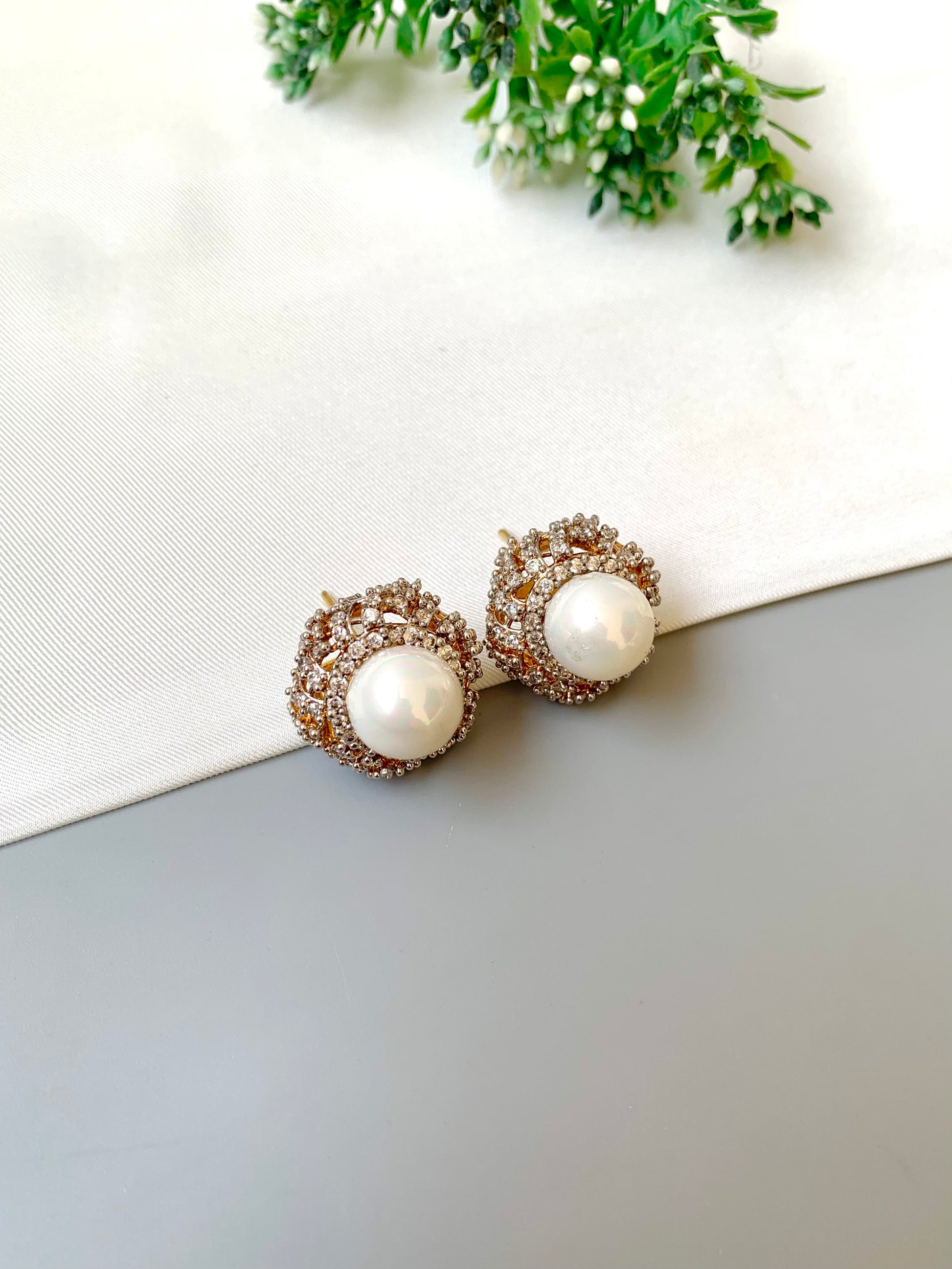 Belle signature pearl studs with American diamonds in rose tone setting
