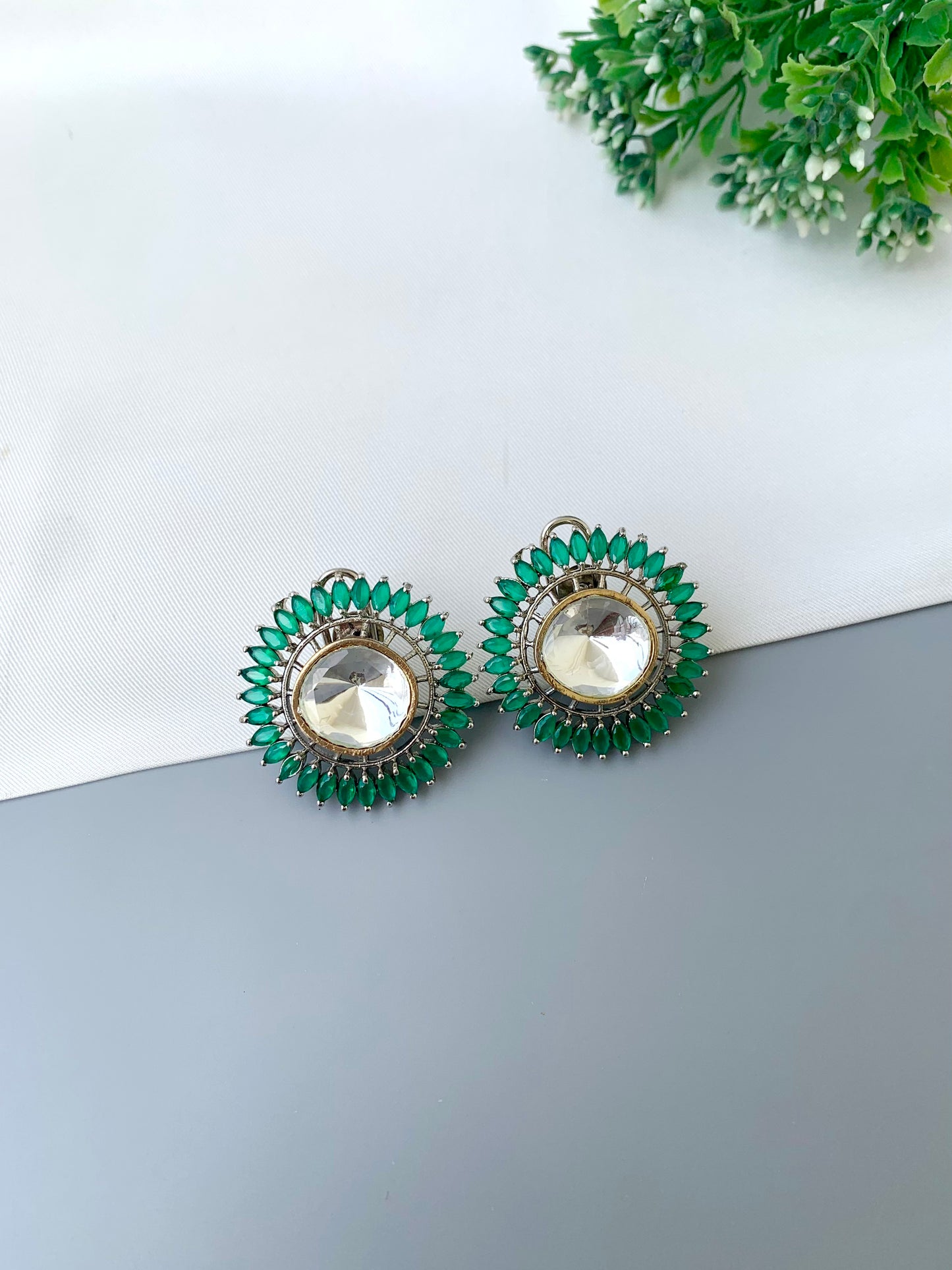 Cila emerald polki kundan studs in rhodium plating with semi precious gemstone