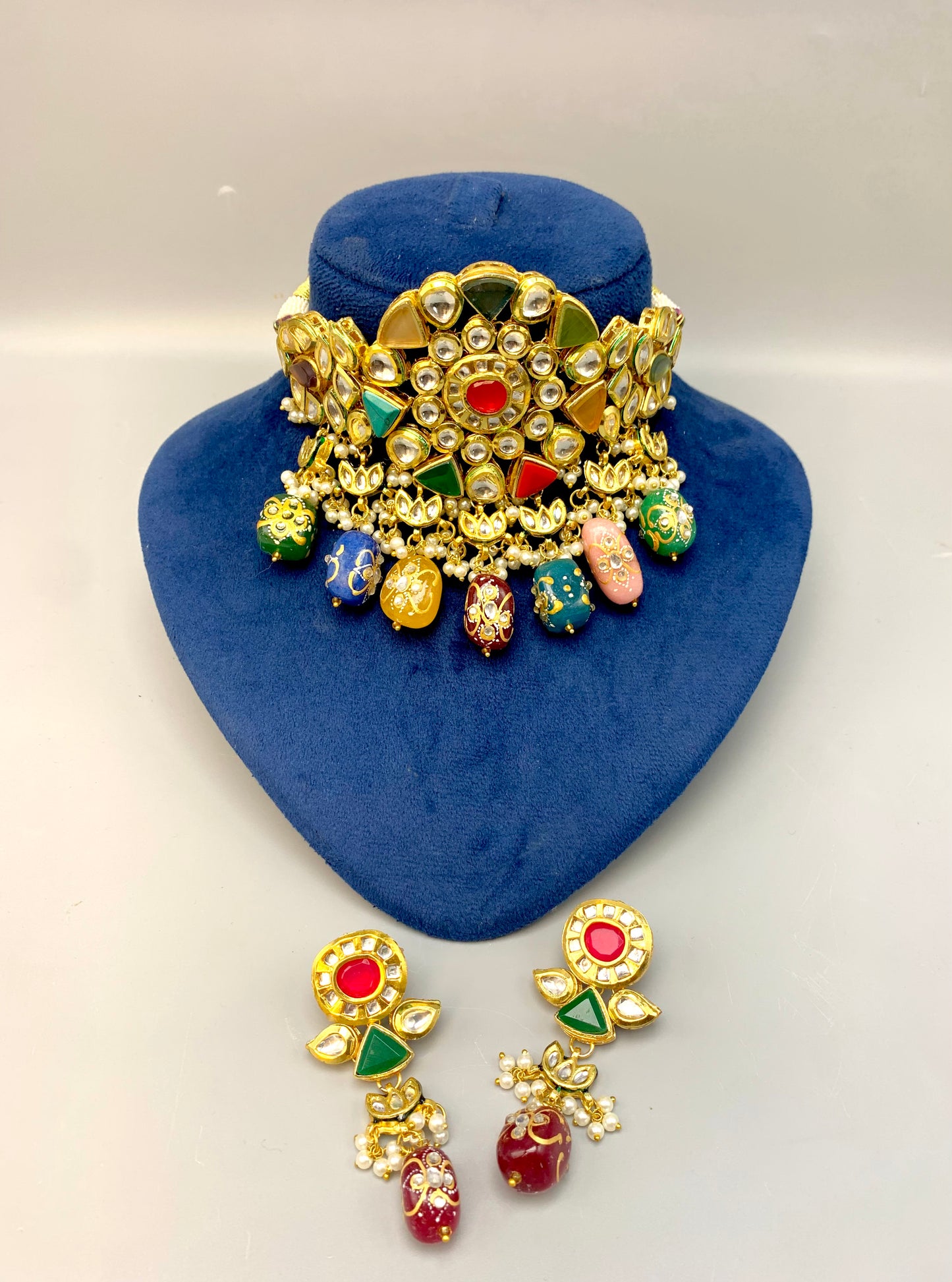 Damna handcrafted 22kt gold plated choker set with authentic Polki Kundan, hand-painted meena, Nauratan stones, pearls and natural gemstones