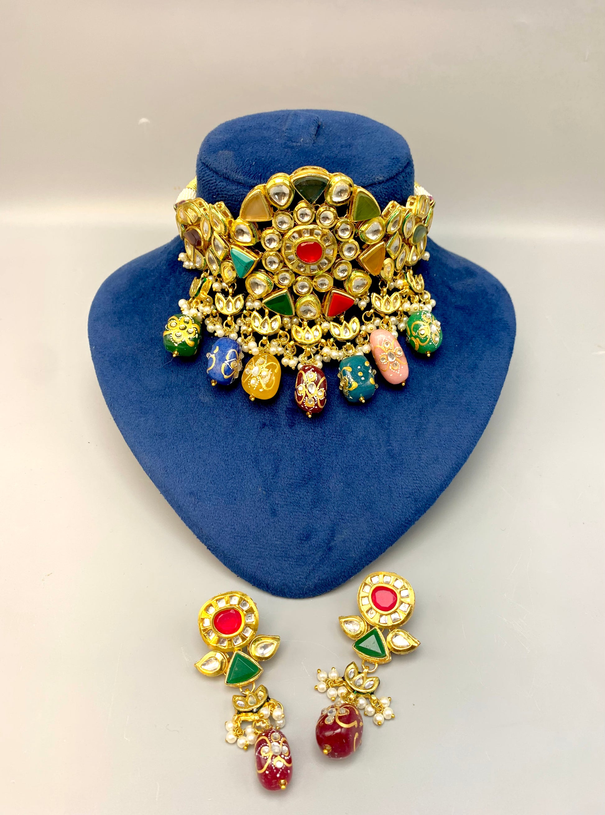 Damna handcrafted 22kt gold plated choker set with authentic Polki Kundan, hand-painted meena, Nauratan stones, pearls and natural gemstones
