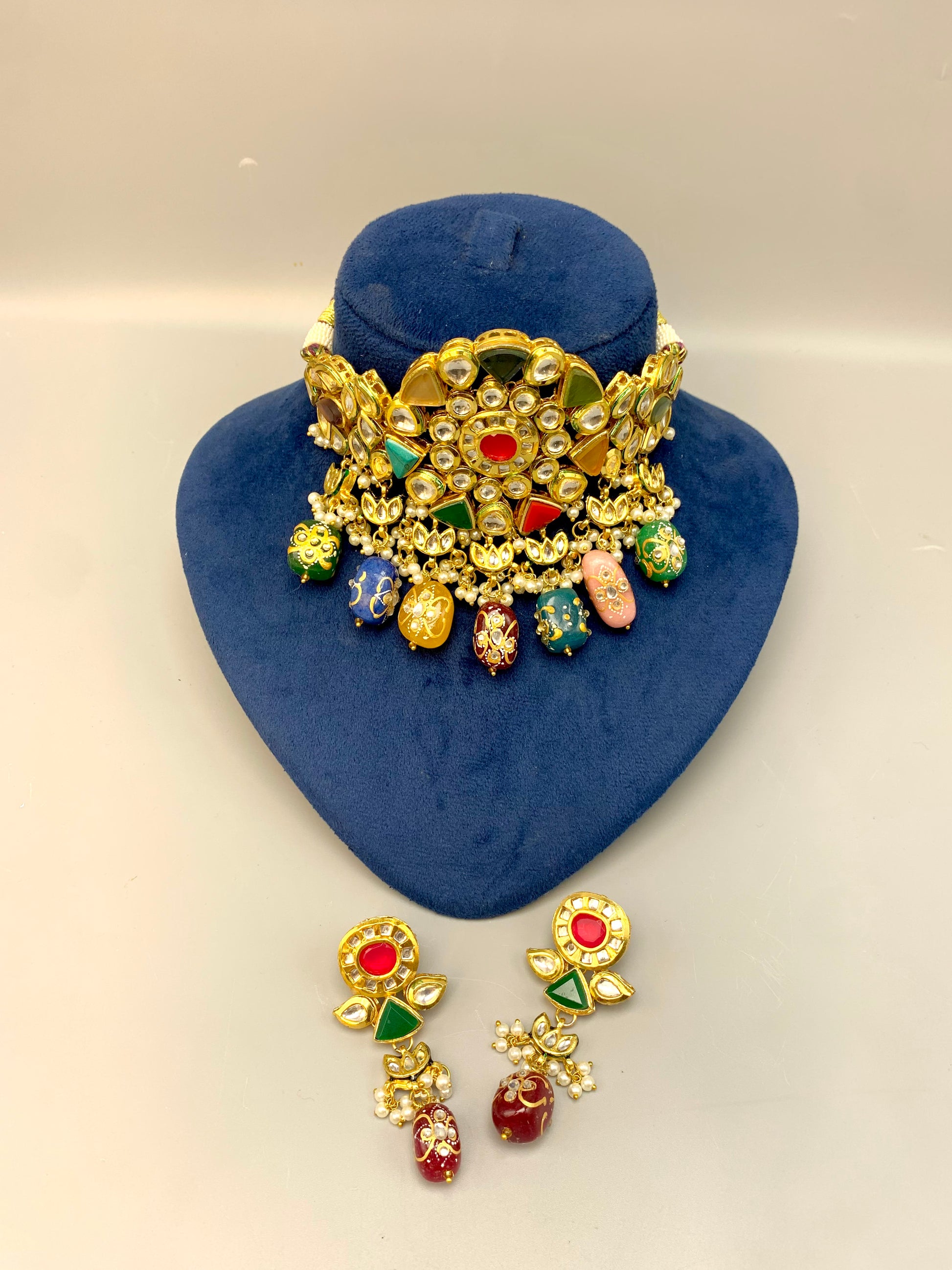 Damna handcrafted 22kt gold plated choker set with authentic Polki Kundan, hand-painted meena, Nauratan stones, pearls and natural gemstones