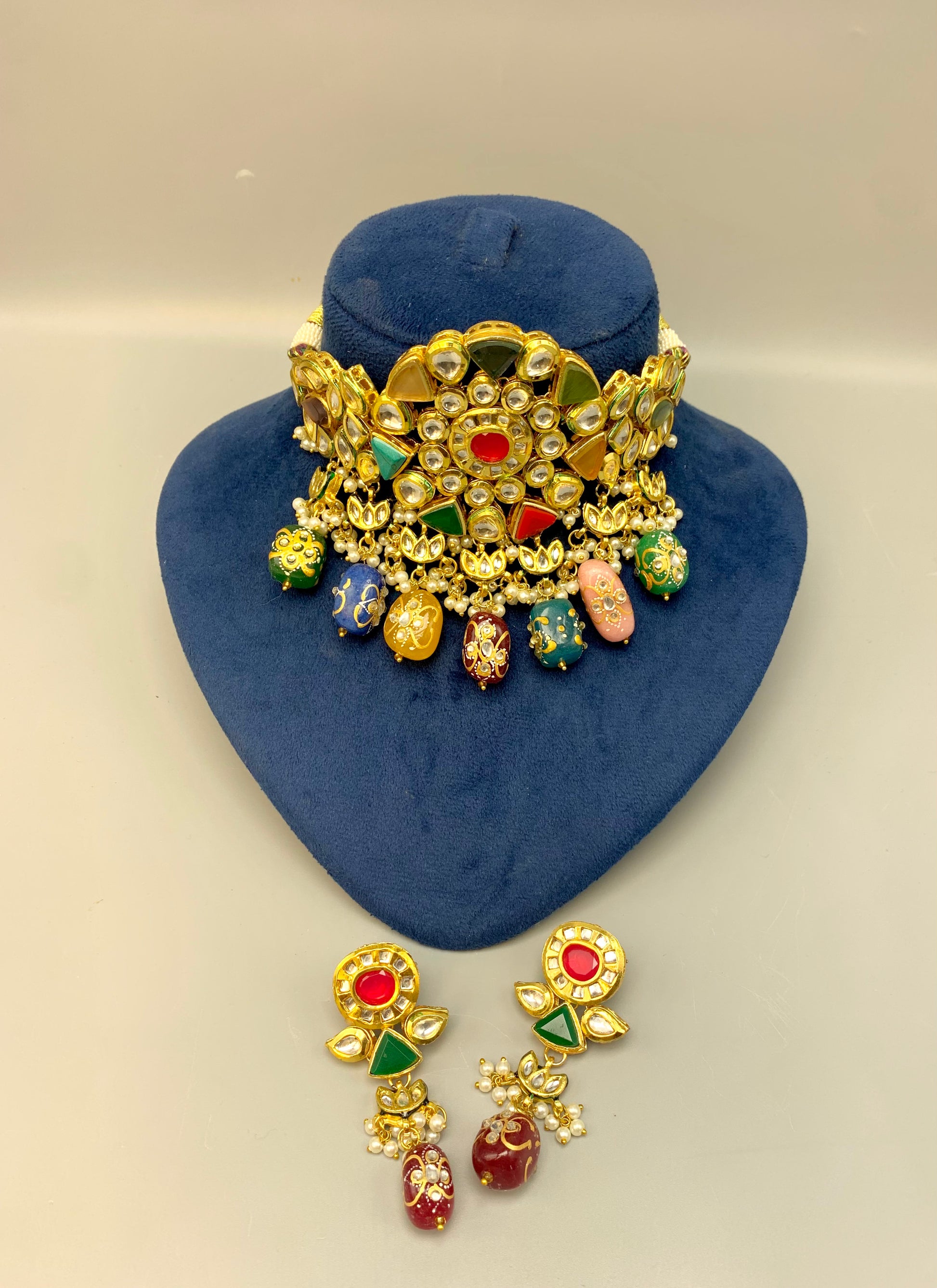 Damna handcrafted 22kt gold plated choker set with authentic Polki Kundan, hand-painted meena, Nauratan stones, pearls and natural gemstones