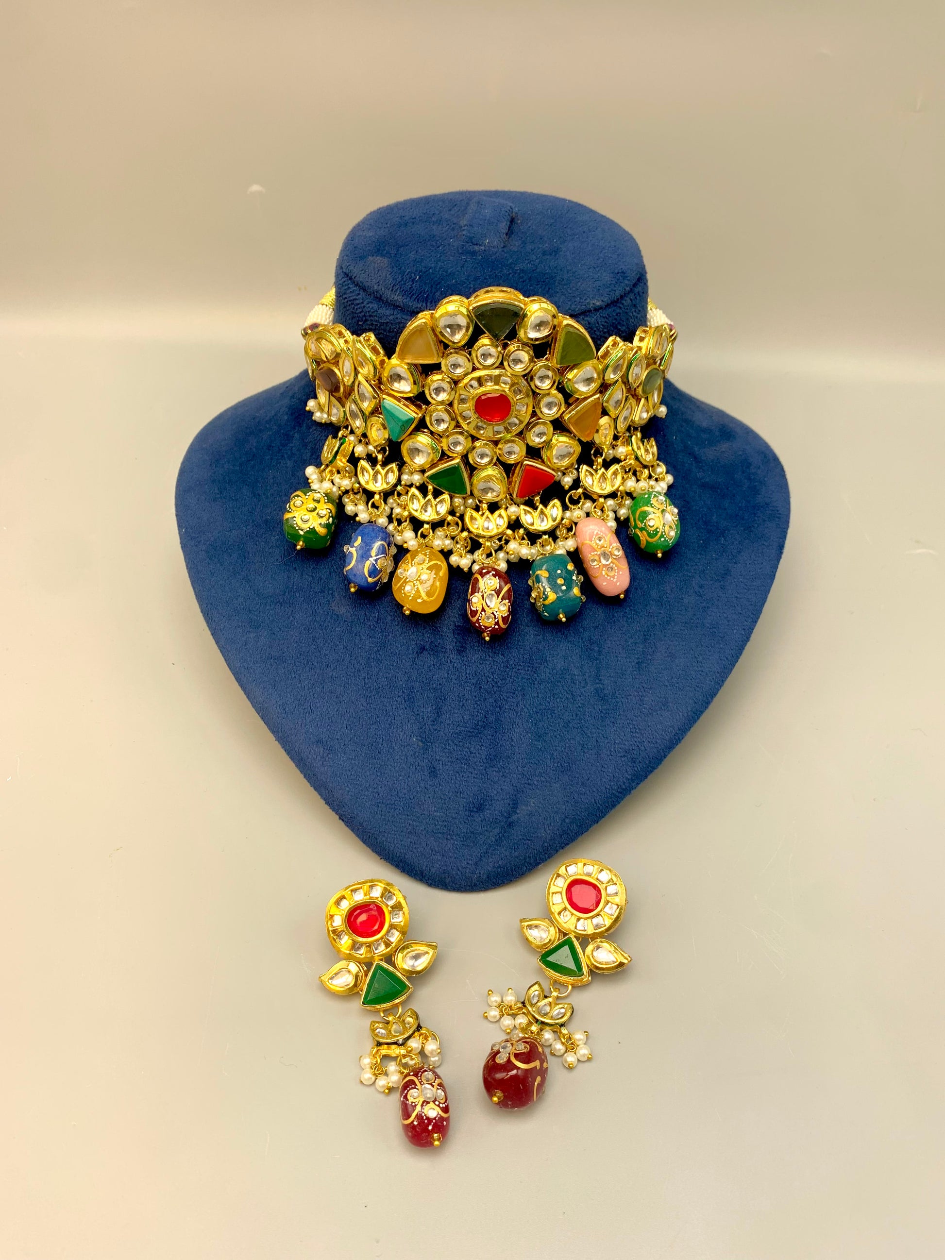 Damna handcrafted 22kt gold plated choker set with authentic Polki Kundan, hand-painted meena, Nauratan stones, pearls and natural gemstones