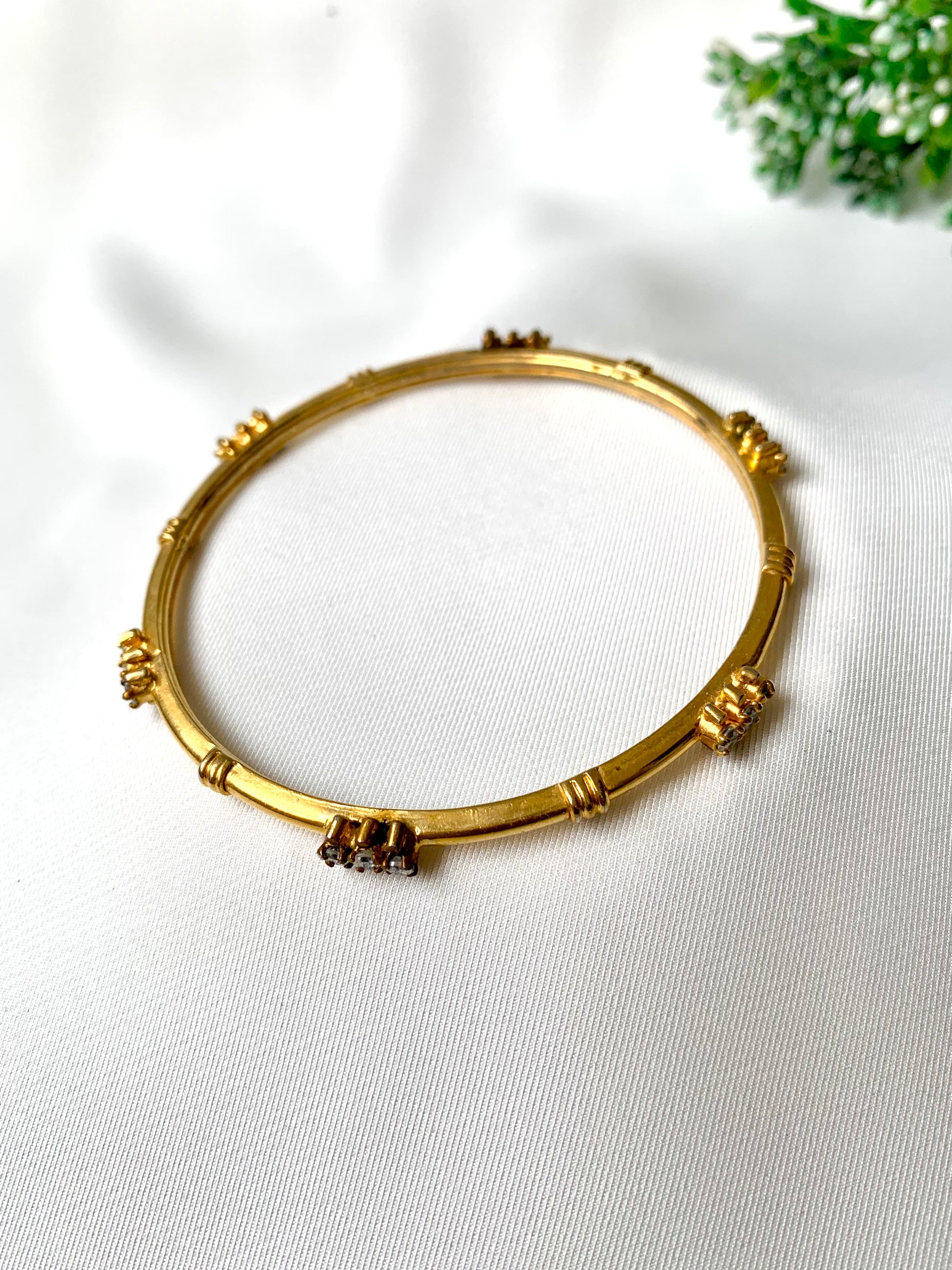 Handcrafted 22kt gold plated bangle with diamond finish and high quality American Diamonds