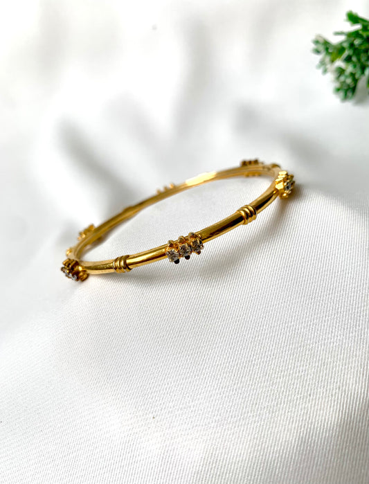 Handcrafted 22kt gold plated bangle with diamond finish and high quality American Diamonds