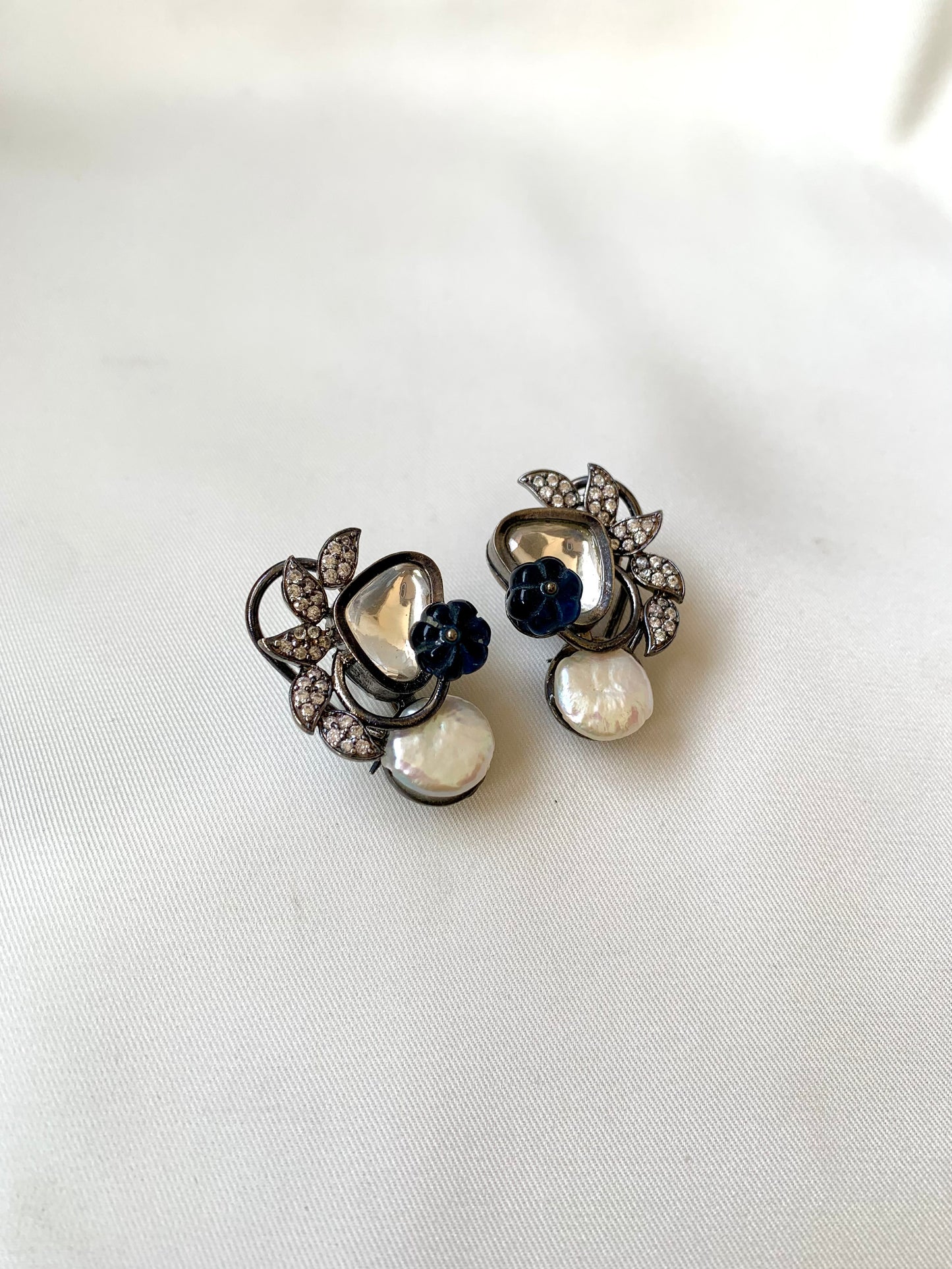 Elawi handcrafted rhodium oxidized designer earrings with polki kundan and hand carved melon beads