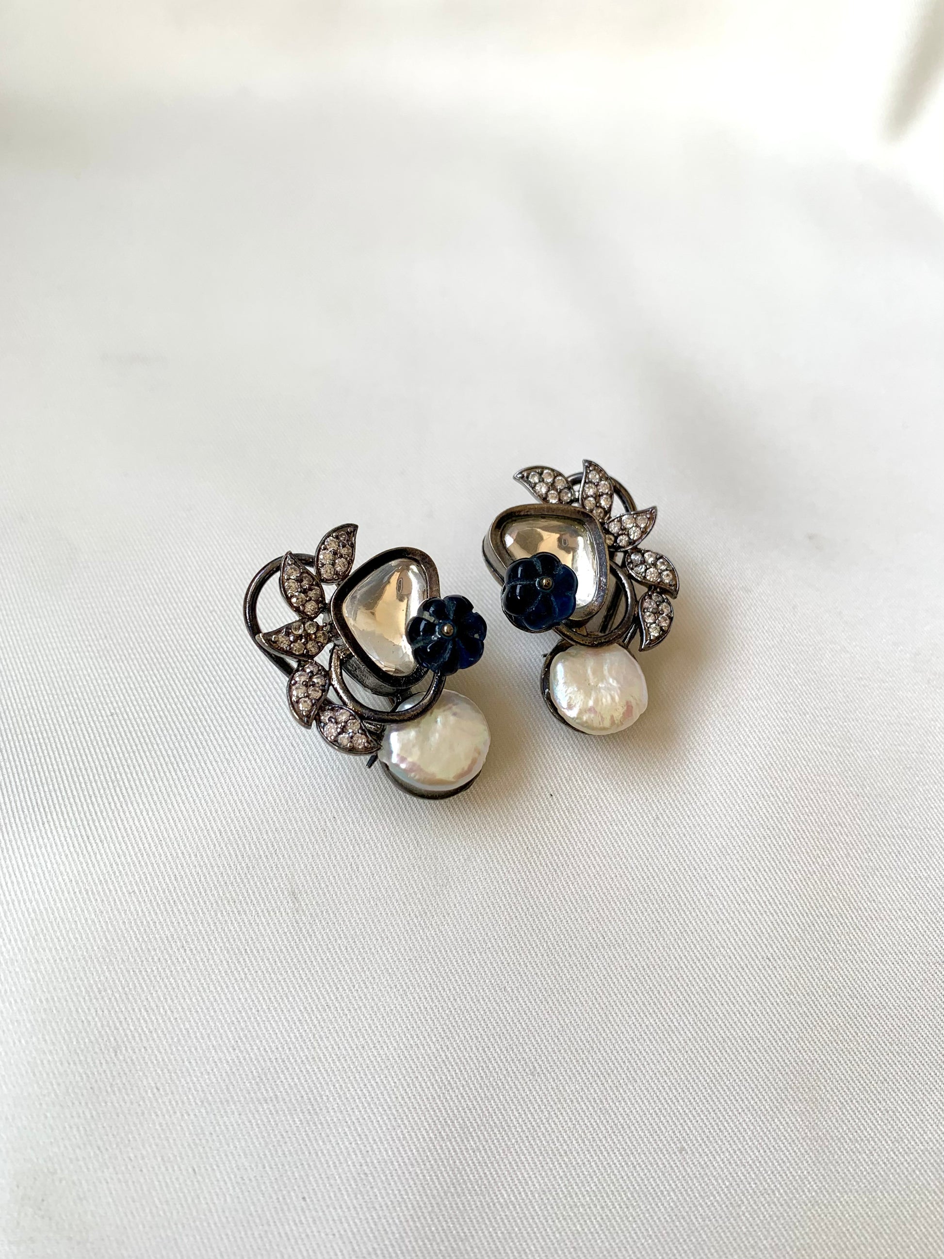 Elawi handcrafted rhodium oxidized designer earrings with polki kundan and hand carved melon beads