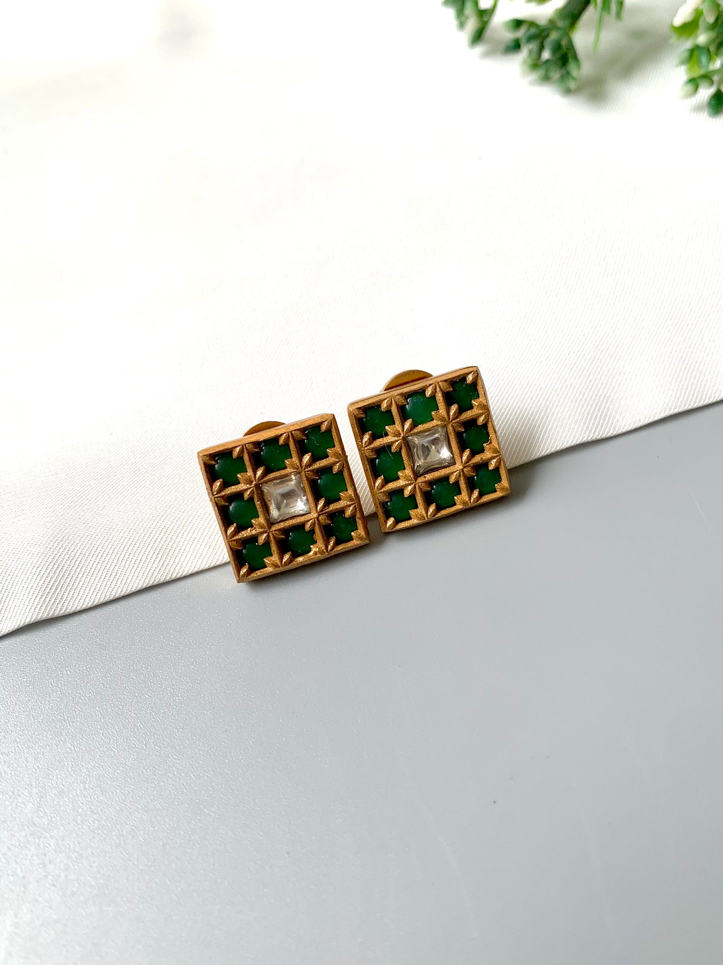 Square handcrafted emerald and Polki Kundan studs with 22kt gold plating
