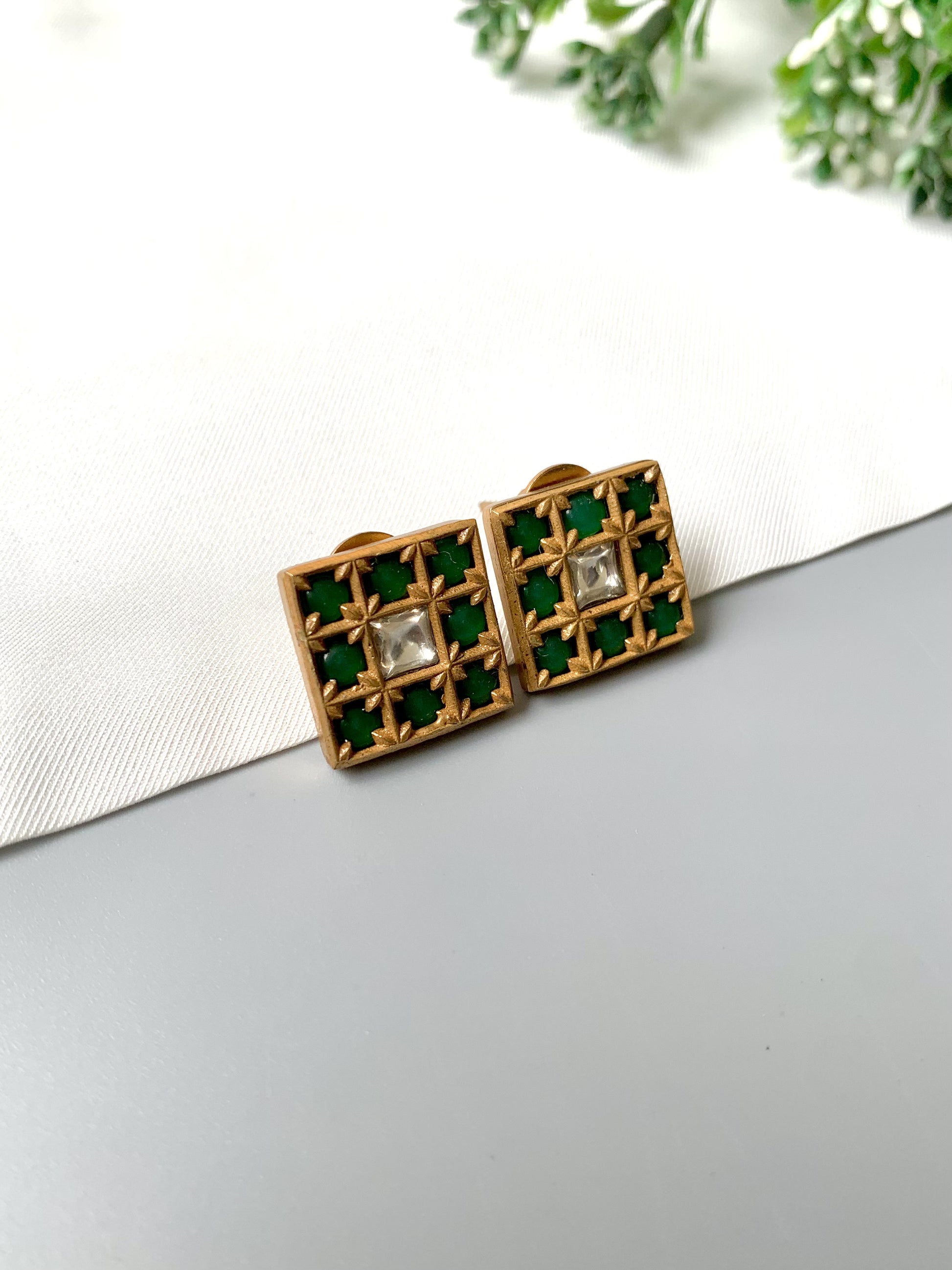 Square handcrafted emerald and Polki Kundan studs with 22kt gold plating