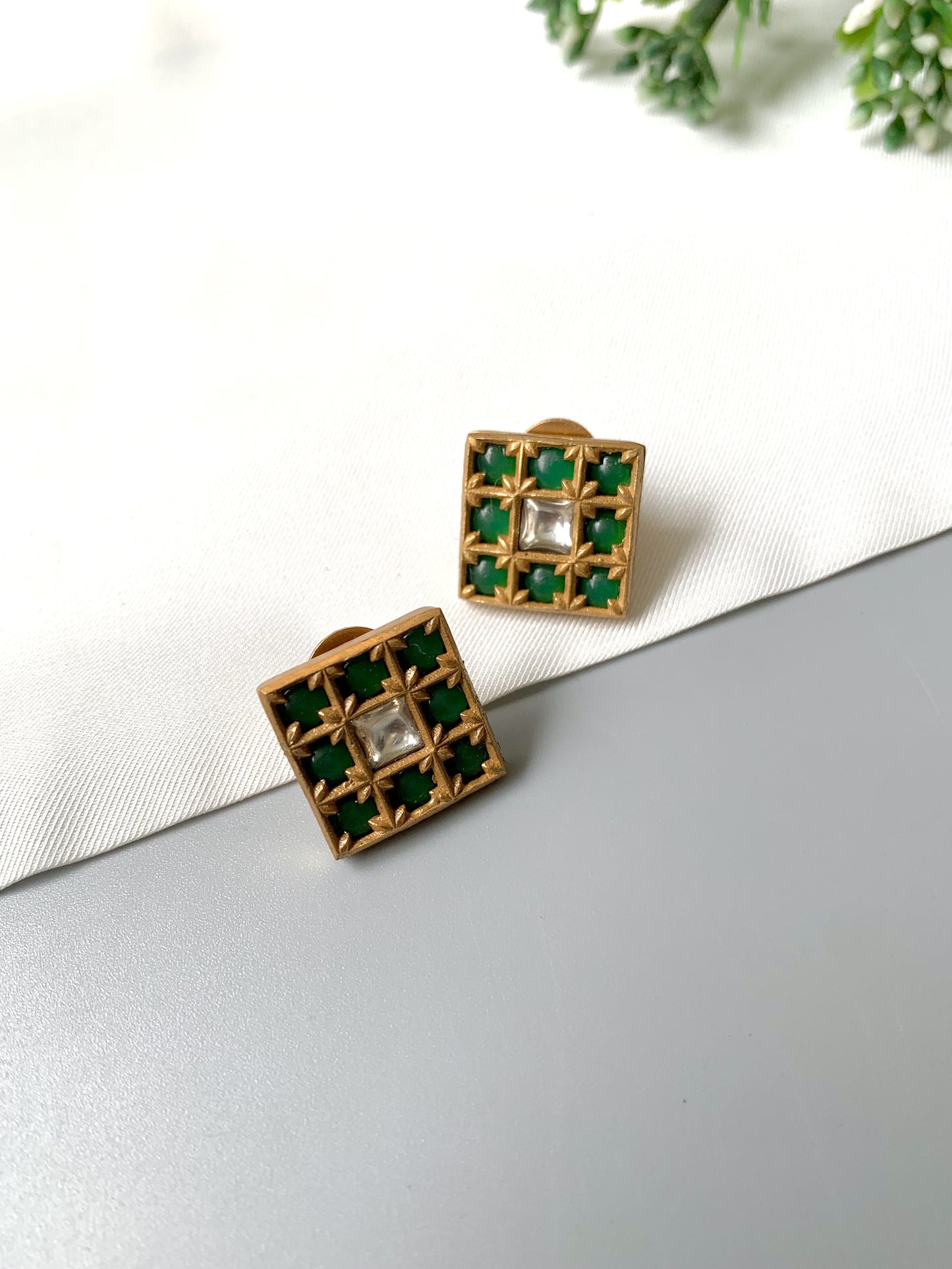 Square handcrafted emerald and Polki Kundan studs with 22kt gold plating