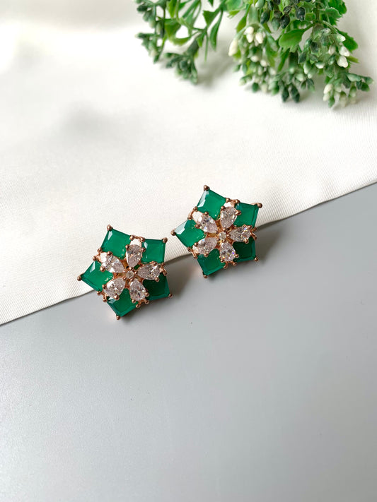Handcrafted emerald studs with rose gold oxidized finish 