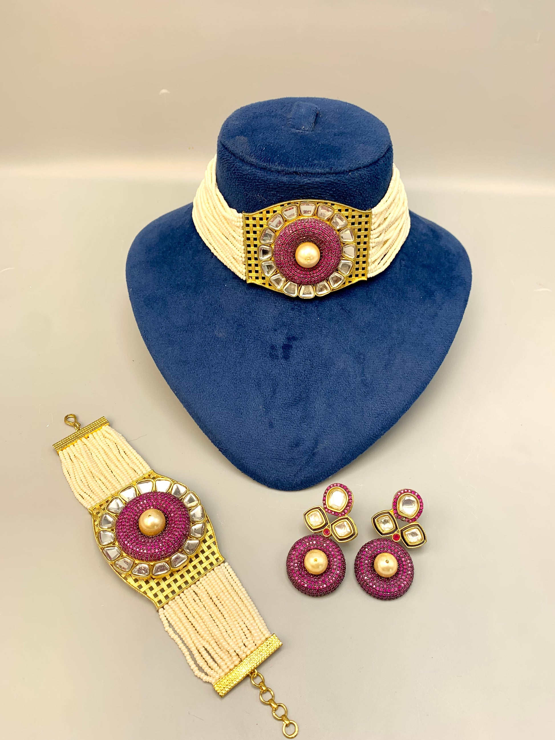 Emilia handcrafted 22kt gold plated choker set with Polki Kundan, Swarovski crystals, semi-precious pearls and matching bracelet