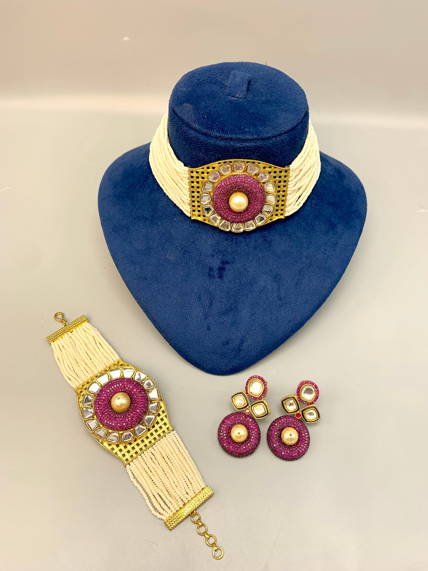 Emilia handcrafted 22kt gold plated choker set with Polki Kundan, Swarovski crystals, semi-precious pearls and matching bracelet