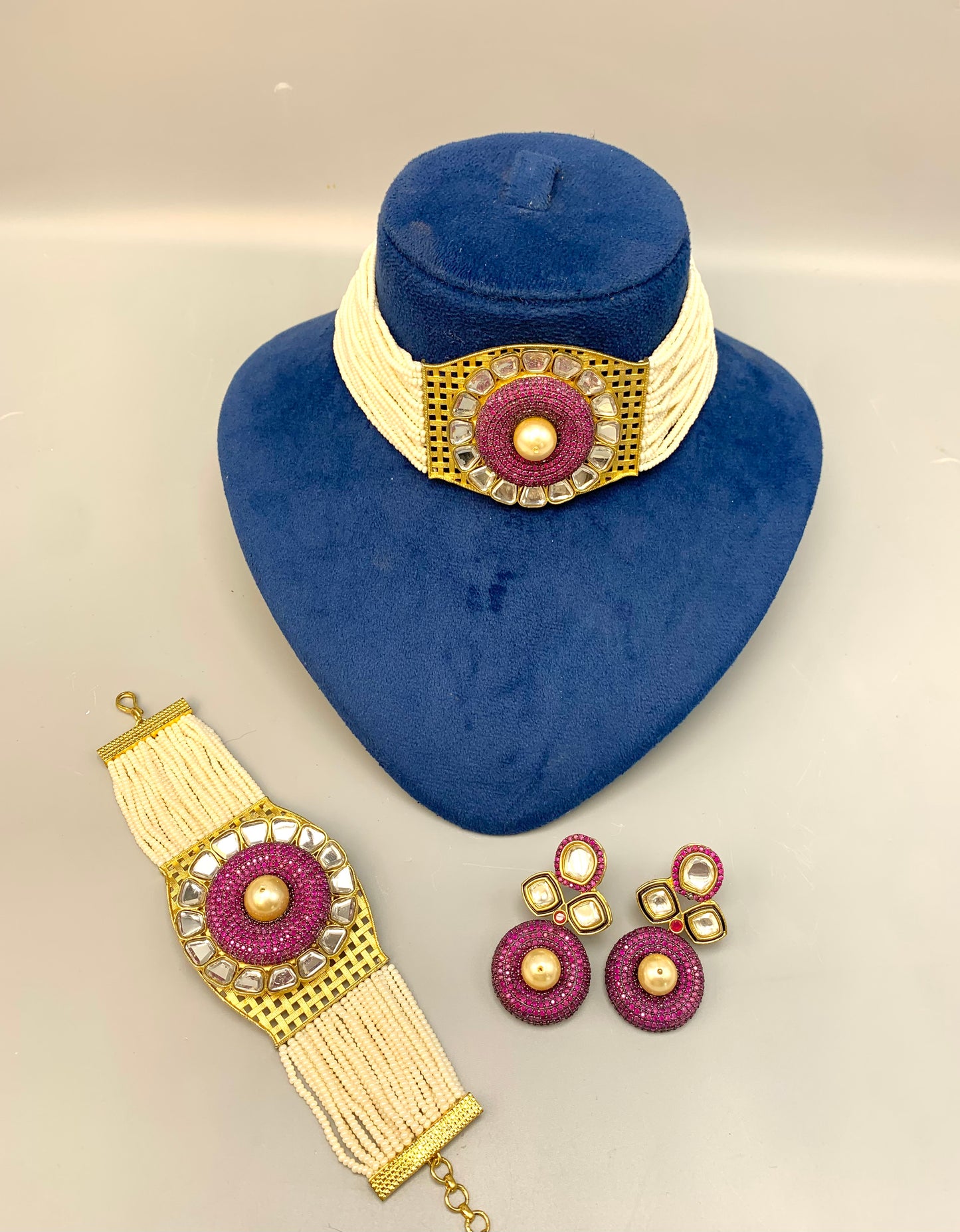 Emilia handcrafted 22kt gold plated choker set with Polki Kundan, Swarovski crystals, semi-precious pearls and matching bracelet