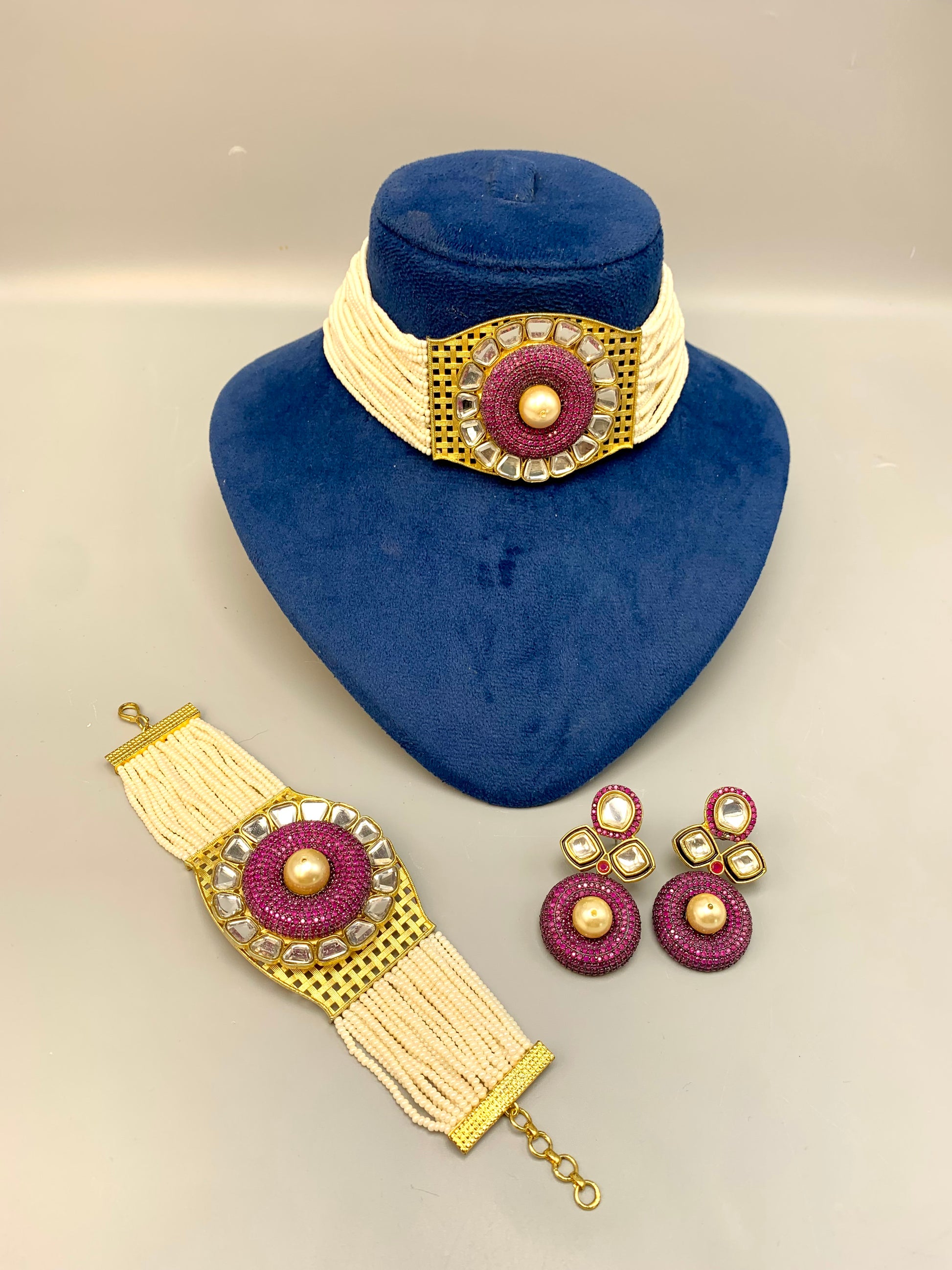 Emilia handcrafted 22kt gold plated choker set with Polki Kundan, Swarovski crystals, semi-precious pearls and matching bracelet