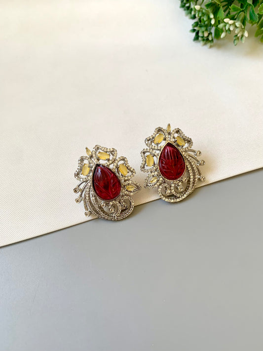 Hand crafted Ena Garnet studs in rhodium plating with diamond finish, featuring American Diamonds, hand carved Garnet and Citrine stones