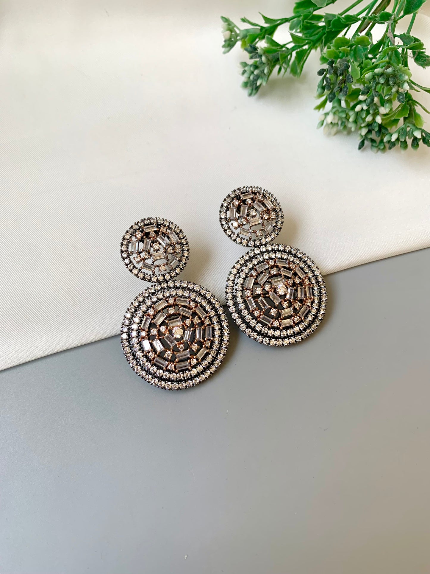 Erika handcrafted rhodium oxidized earrings with high quality American diamonds