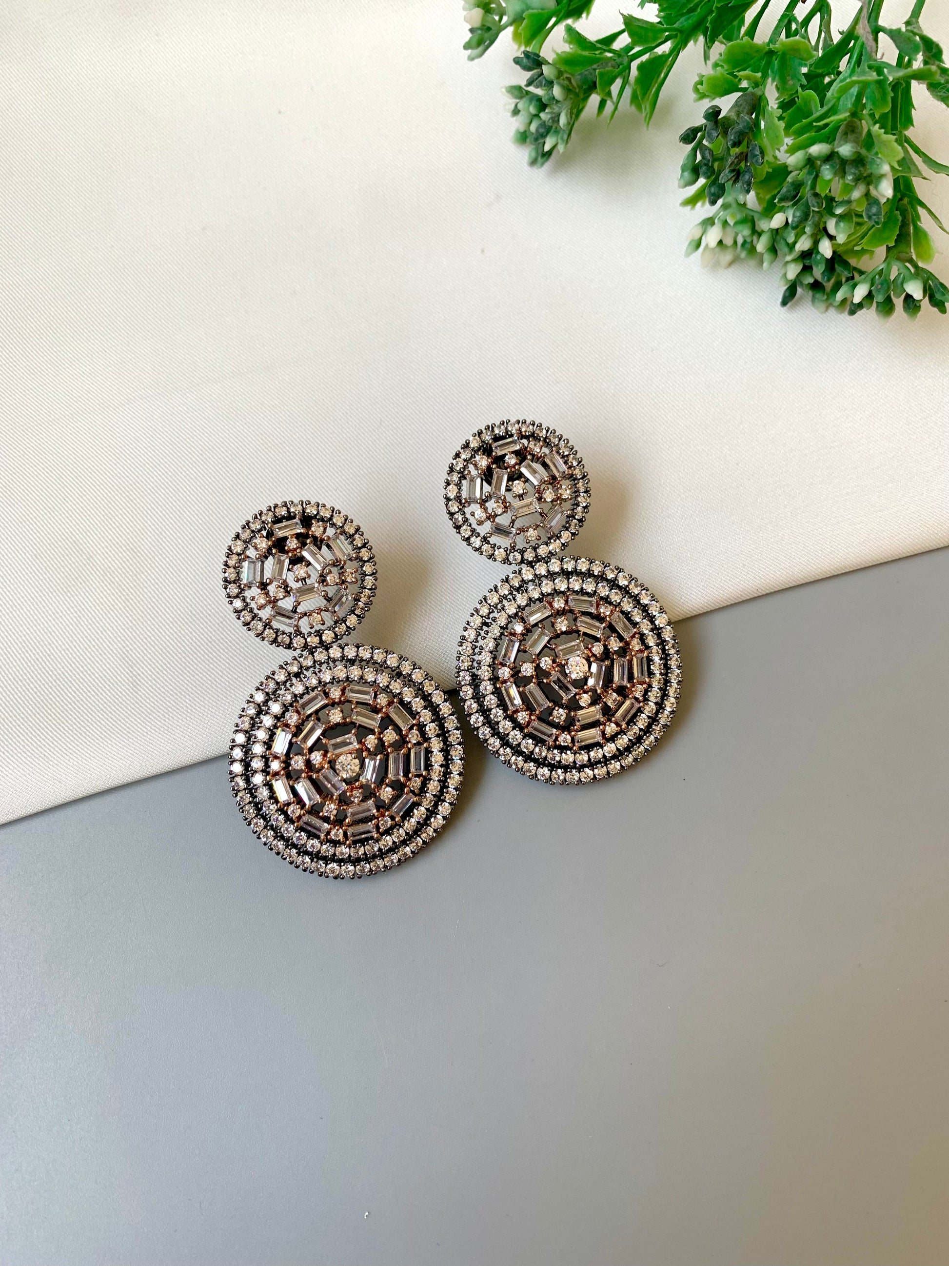 Erika handcrafted rhodium oxidized earrings with high quality American diamonds