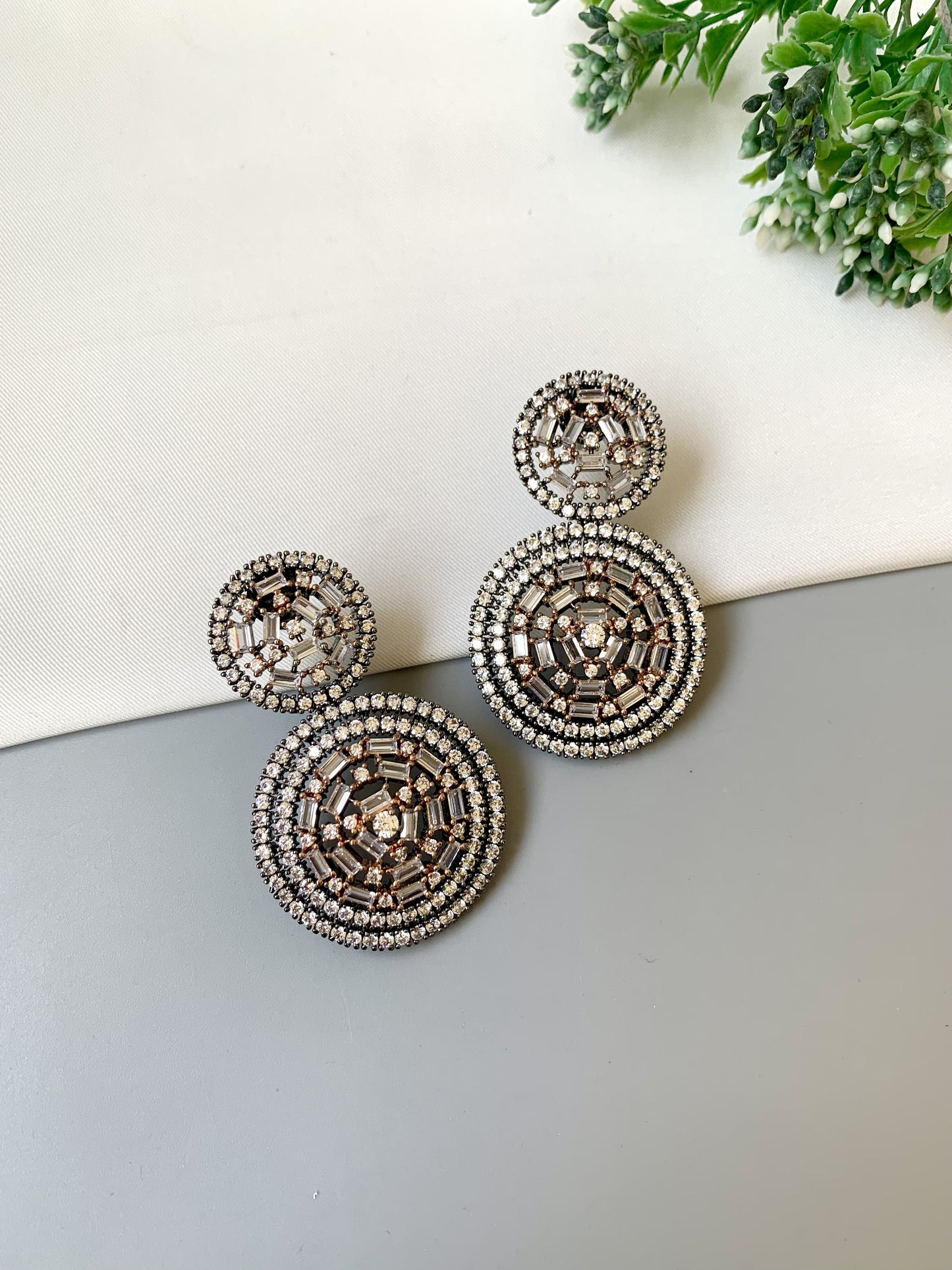 Erika handcrafted rhodium oxidized earrings with high quality American diamonds