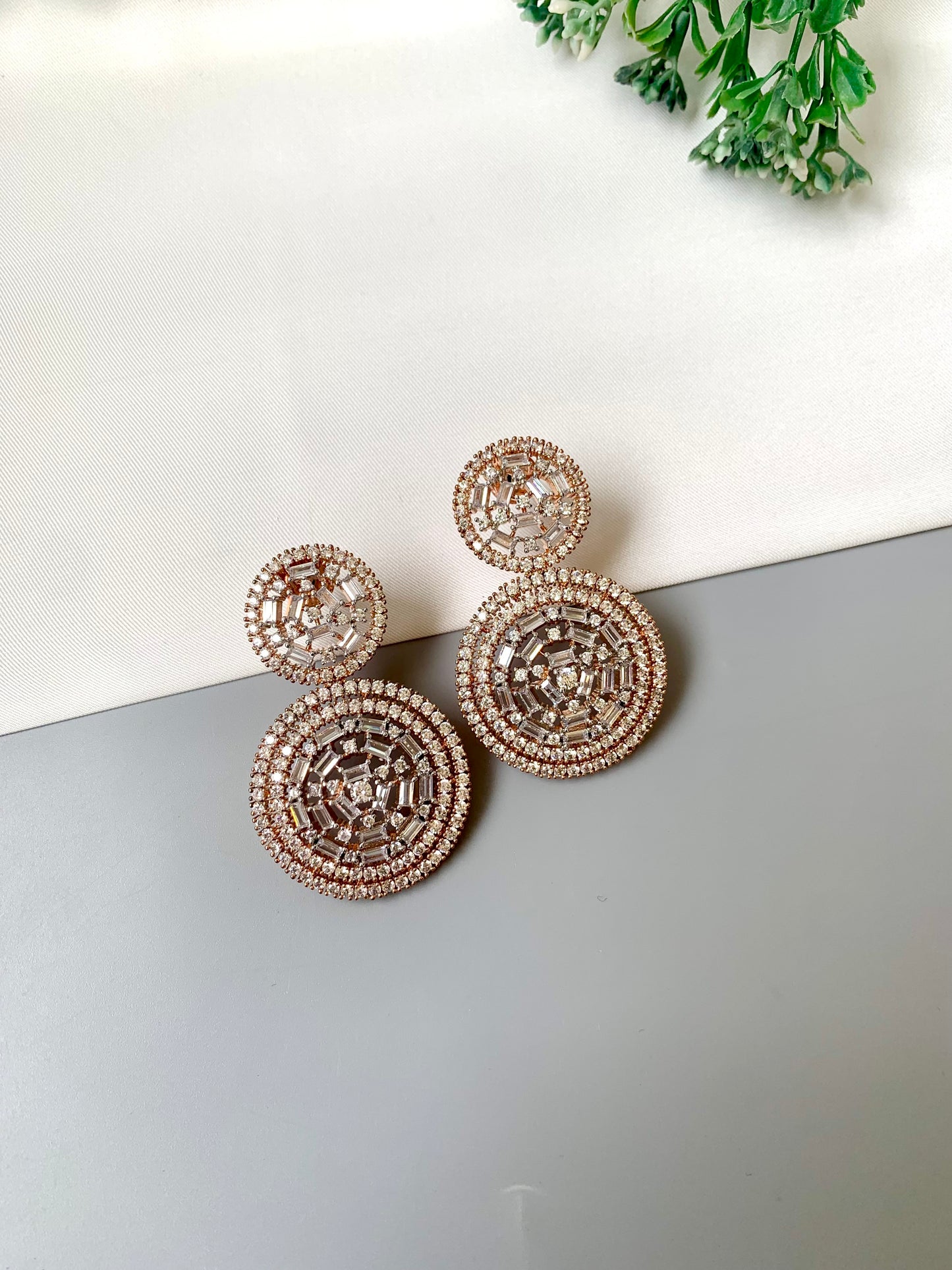 Erika handcrafted rose gold earrings with high quality American diamonds