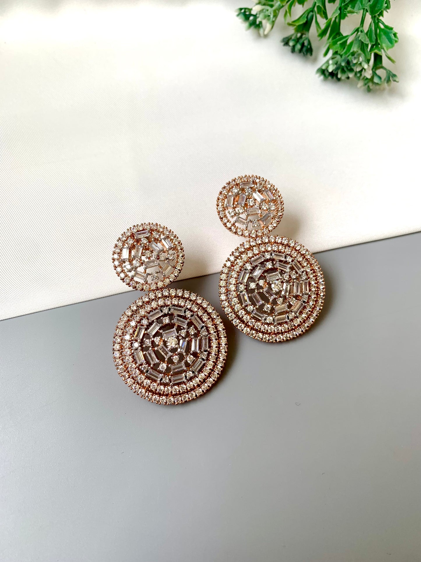 Erika handcrafted rose gold earrings with high quality American diamonds