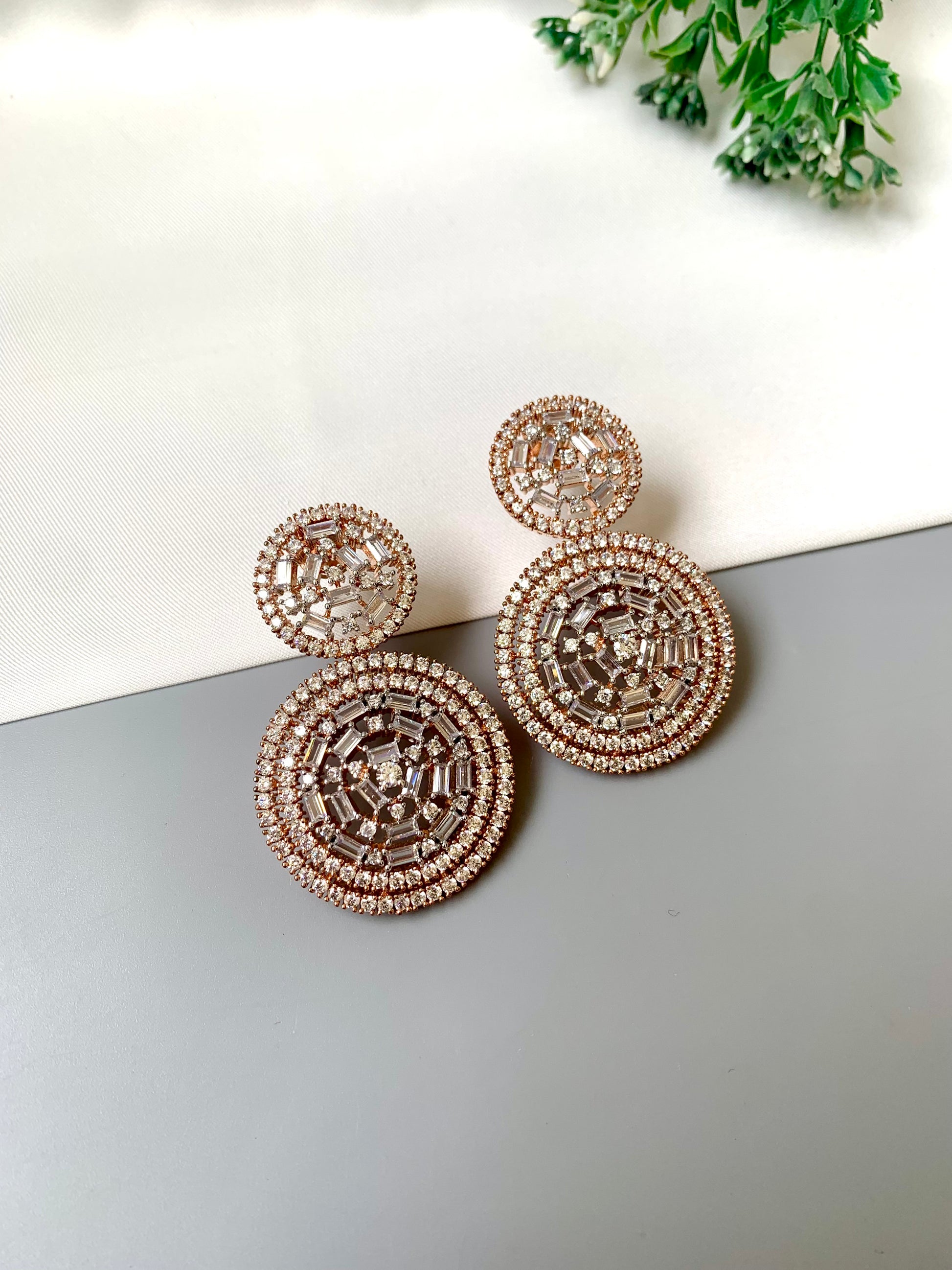 Erika handcrafted rose gold earrings with high quality American diamonds
