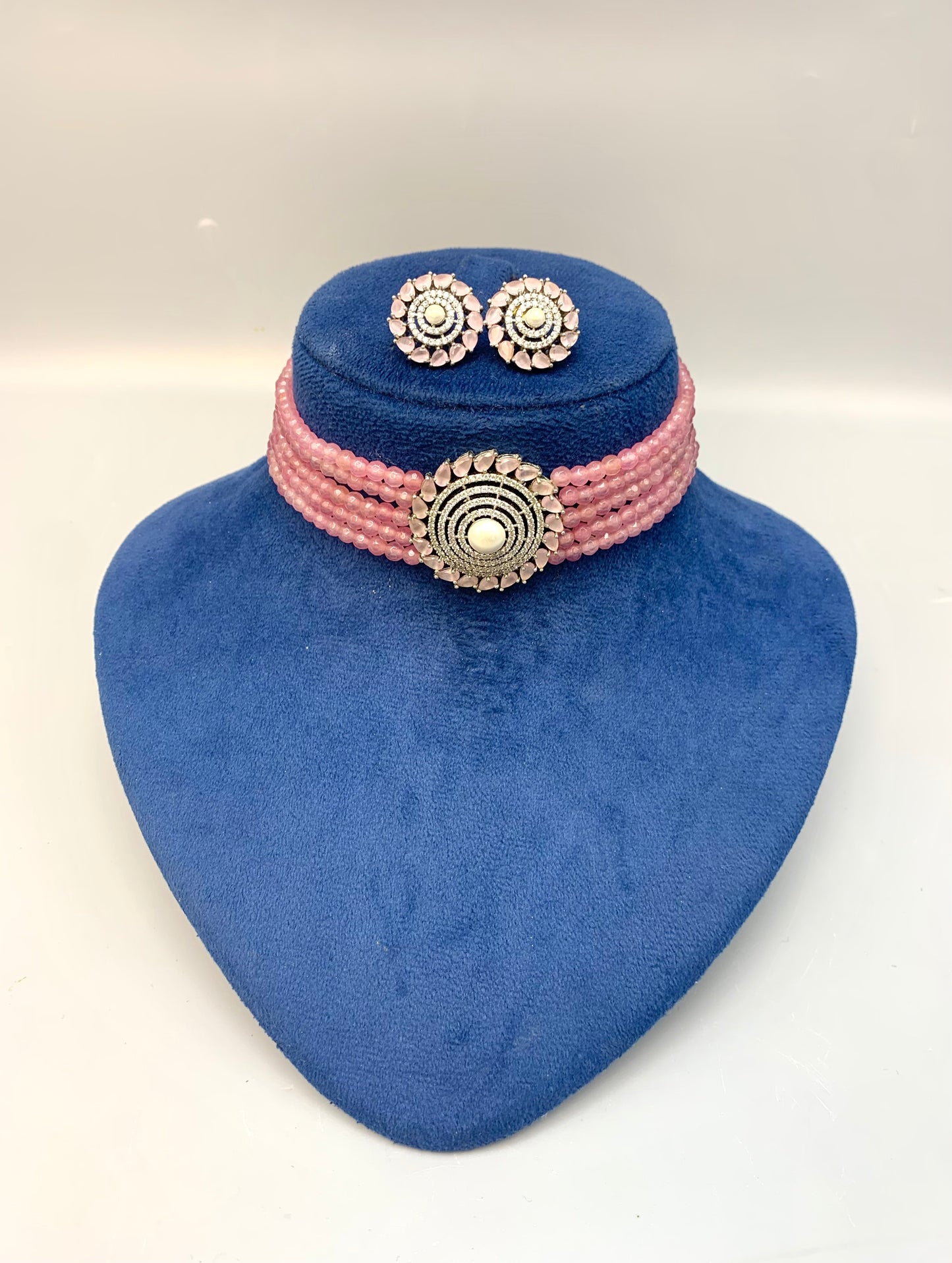 Erina handcrafted rhodium plated choker set with American diamonds pearls and pink Onyx