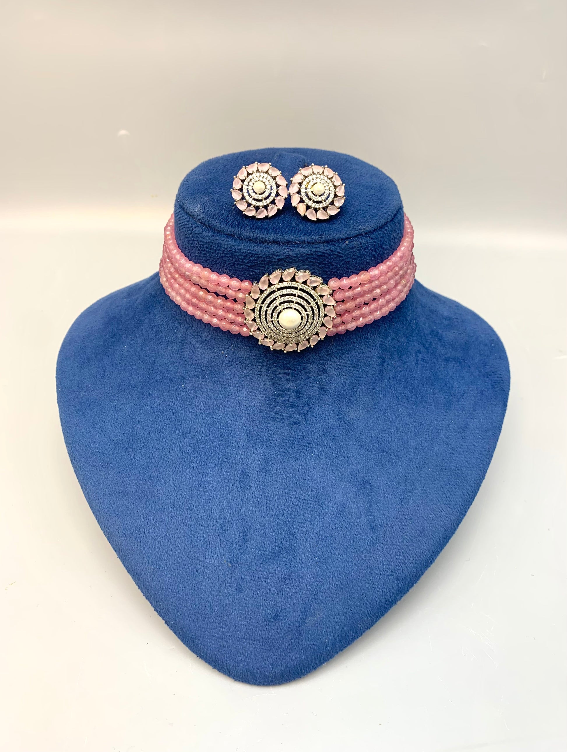 Erina handcrafted rhodium plated choker set with American diamonds pearls and pink Onyx