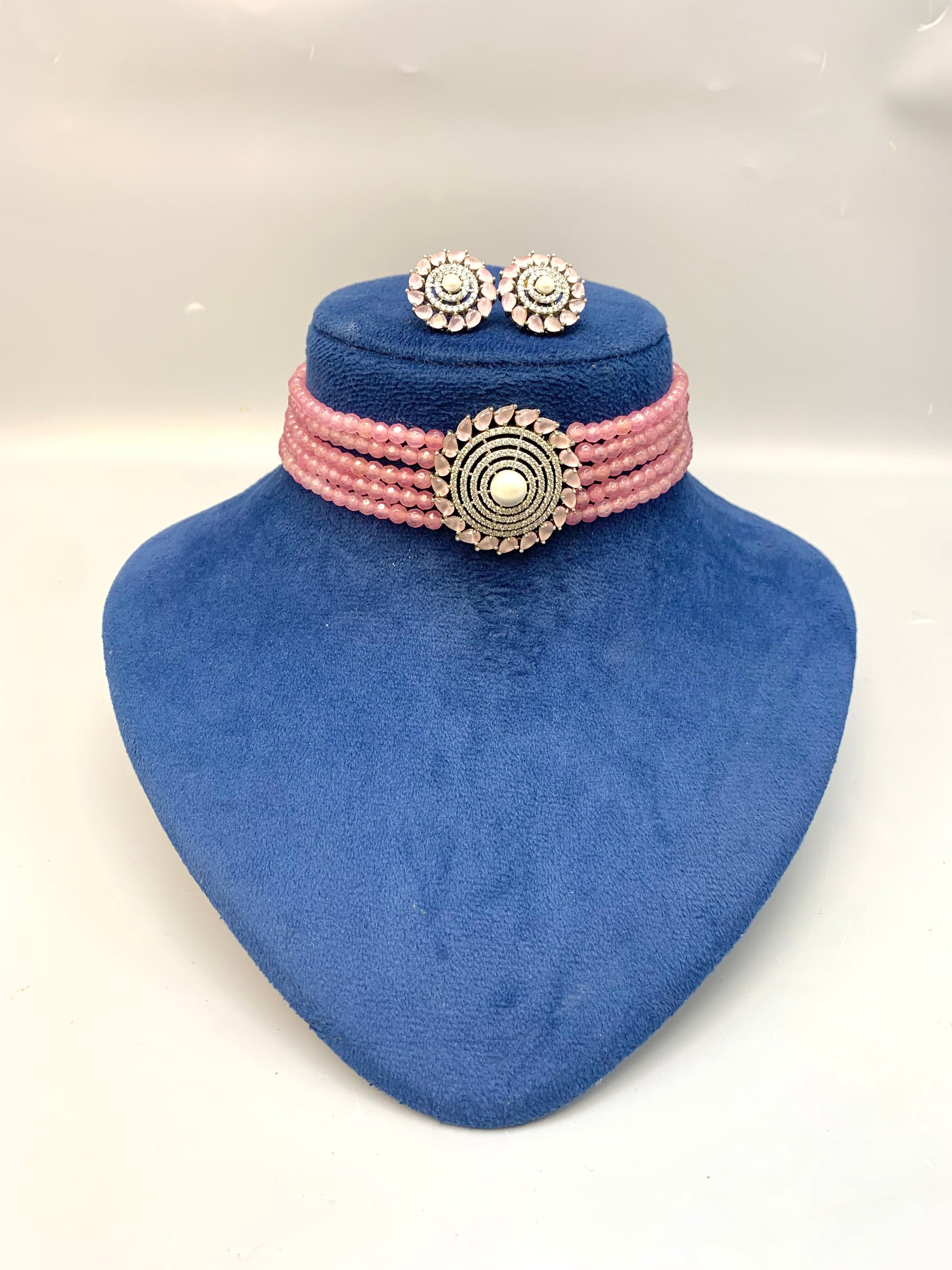 Erina handcrafted rhodium plated choker set with American diamonds pearls and pink Onyx