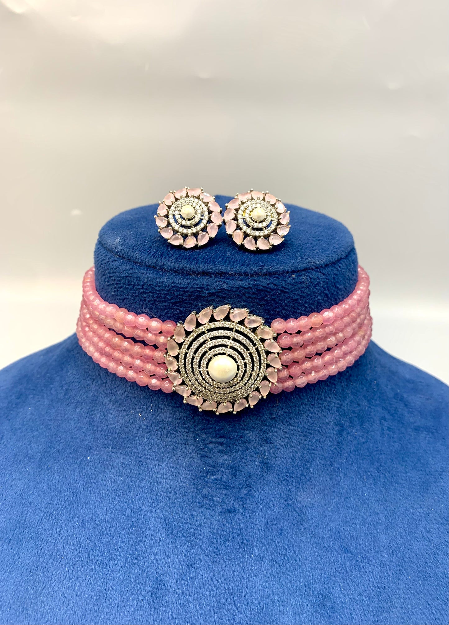 Erina handcrafted rhodium plated choker set with American diamonds pearls and pink Onyx